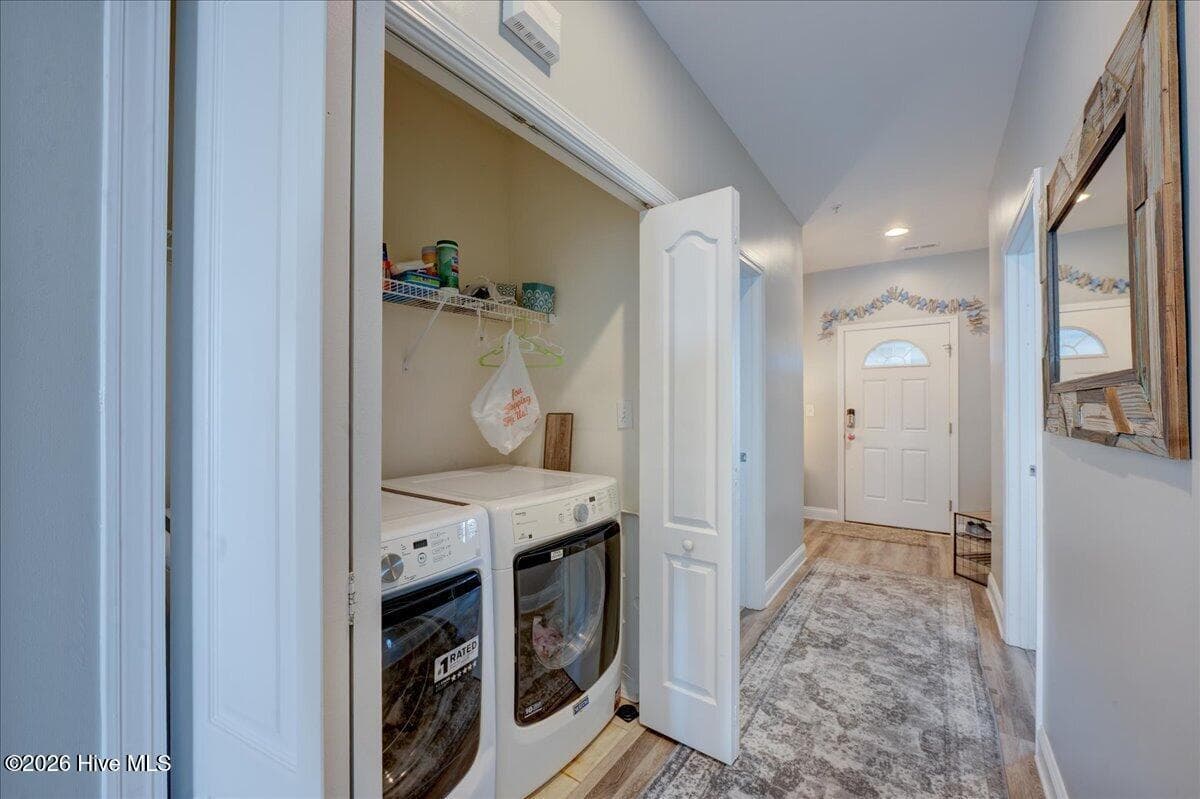 Laundry closet - 104 Pelican Drive H, Atlantic Beach, NC 28512
