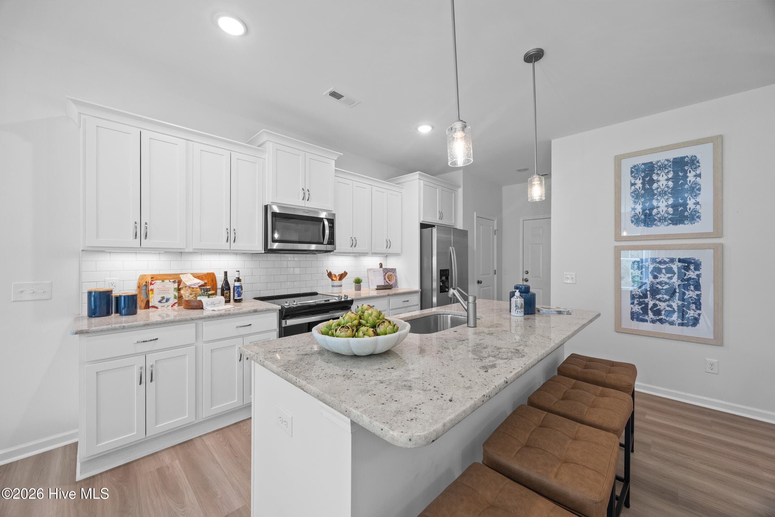 Home shown is a representation of the floor plan and may include optional features or upgrades. Elevations, materials, colors, finishes, square footage, and included features may vary from the actual home. Please consult a Sales Representative for complete details.
Public (Primary) - 629 Pelican Cove Way SE 247, Southport, NC 28461