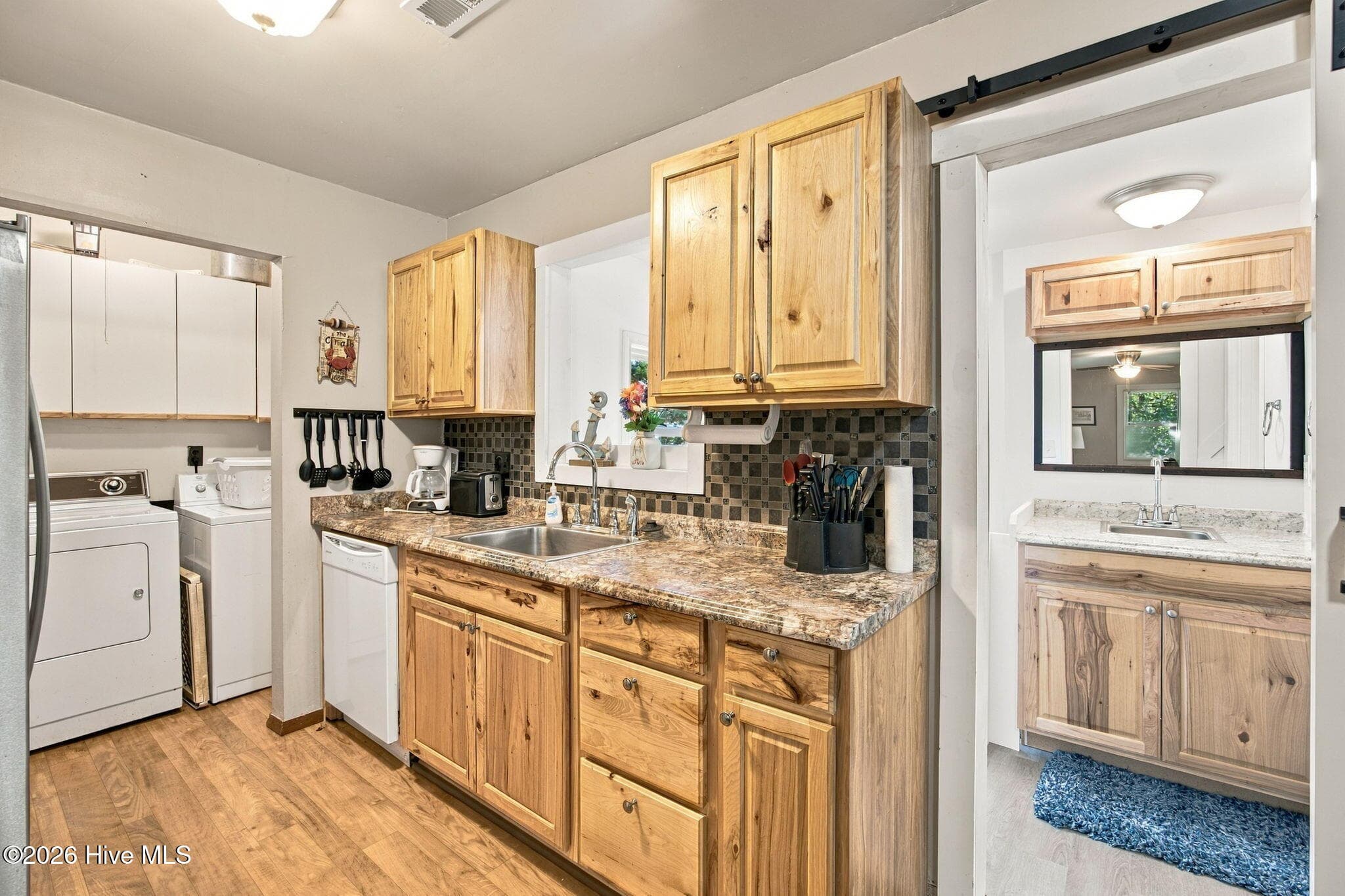 Single Family Residence at 114 NW 21st Street, Oak Island, NC 28465, photo 6 of 9