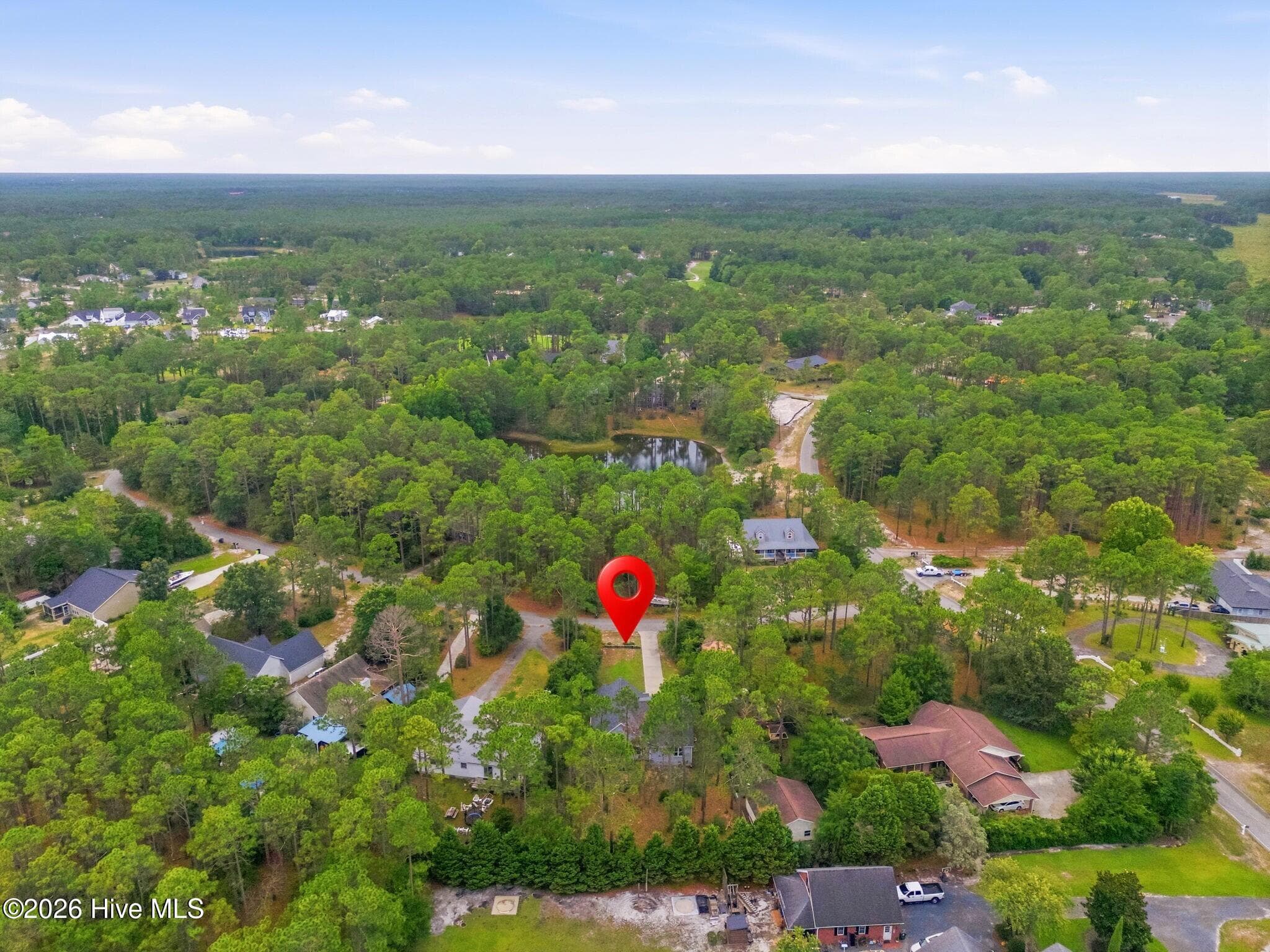 Single Family Residence at 496 Tate Lake Drive, Southport, NC 28461, photo 2 of 3