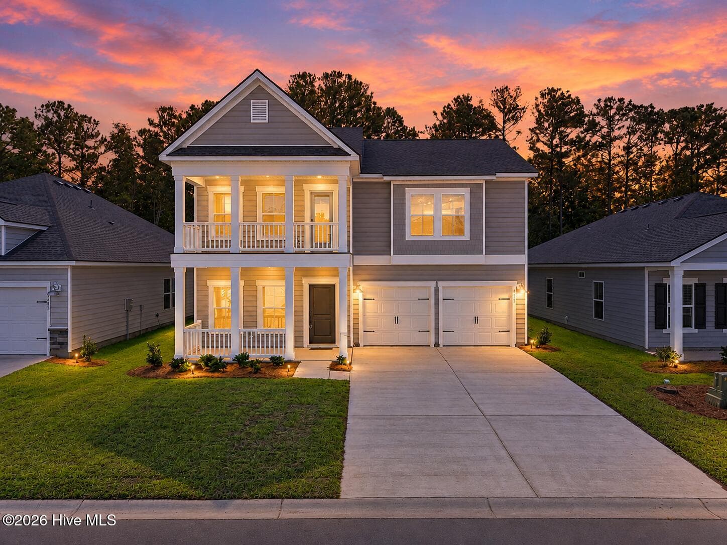 Twilight picture of the property. - 3447 Sandhill Crane Drive SW, Ocean Isle Beach, NC 28469