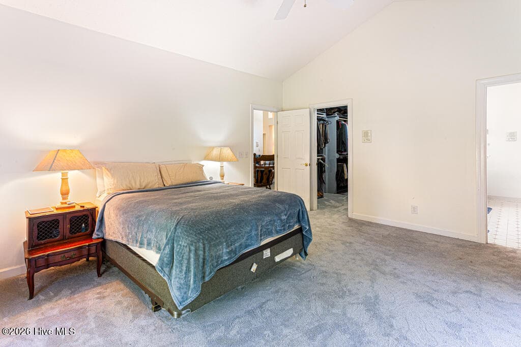 25 Ivy Way Pinehurst NC primary bedroom to walk-in closet - 25 Ivy Way, Pinehurst, NC 28374