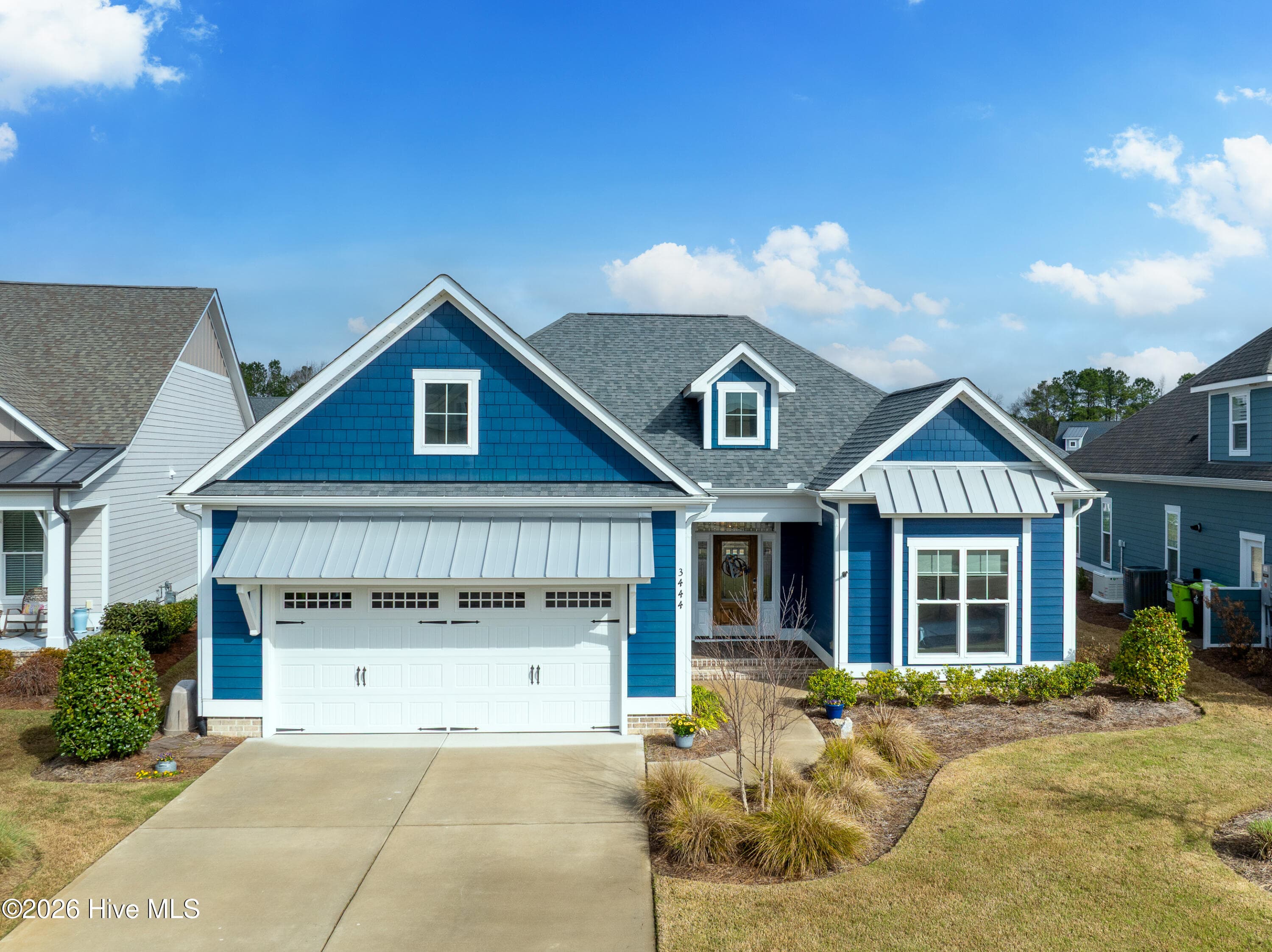 Single Family Residence at 3444 Lake Club Circle, Oak Island, NC 28461, photo 2 of 54