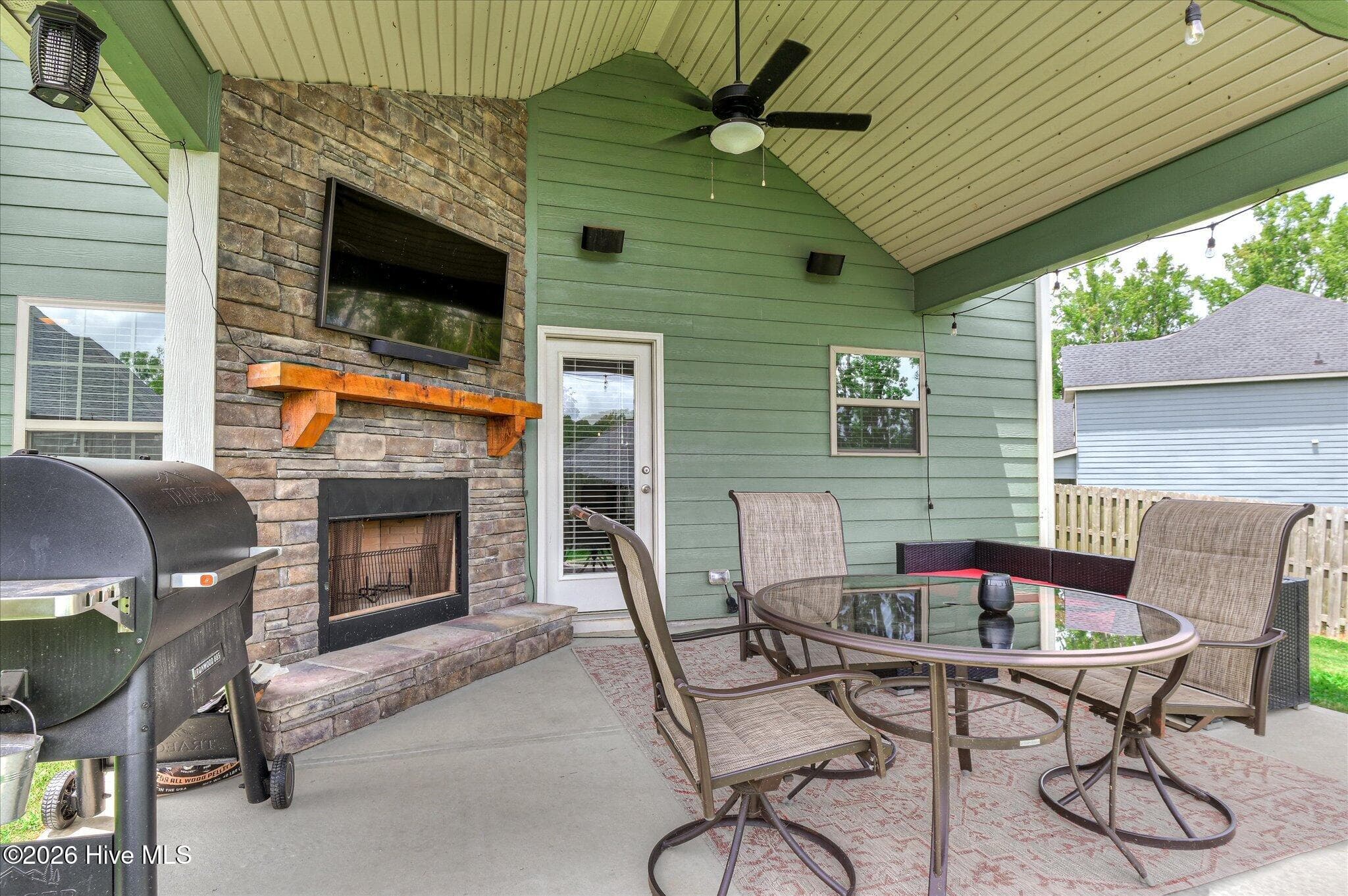 Backyard covered patio w/ wood burning fireplace - 257 Haverford Drive, Grovetown, GA 30813