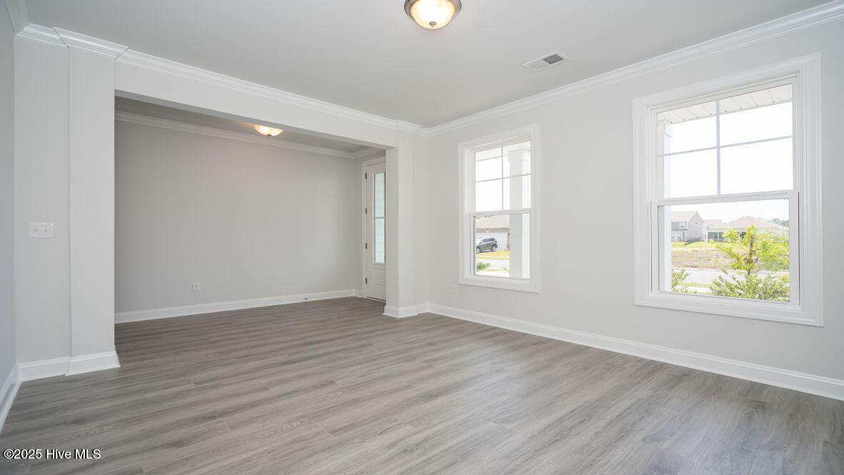 Photo is similar to actual home. Home is currently under construction. Features, colors and options may be different from those shown in representative photos. Call for detailed information. - 3221 Butterfly Ginger Street Lot 74, Leland, NC 28451