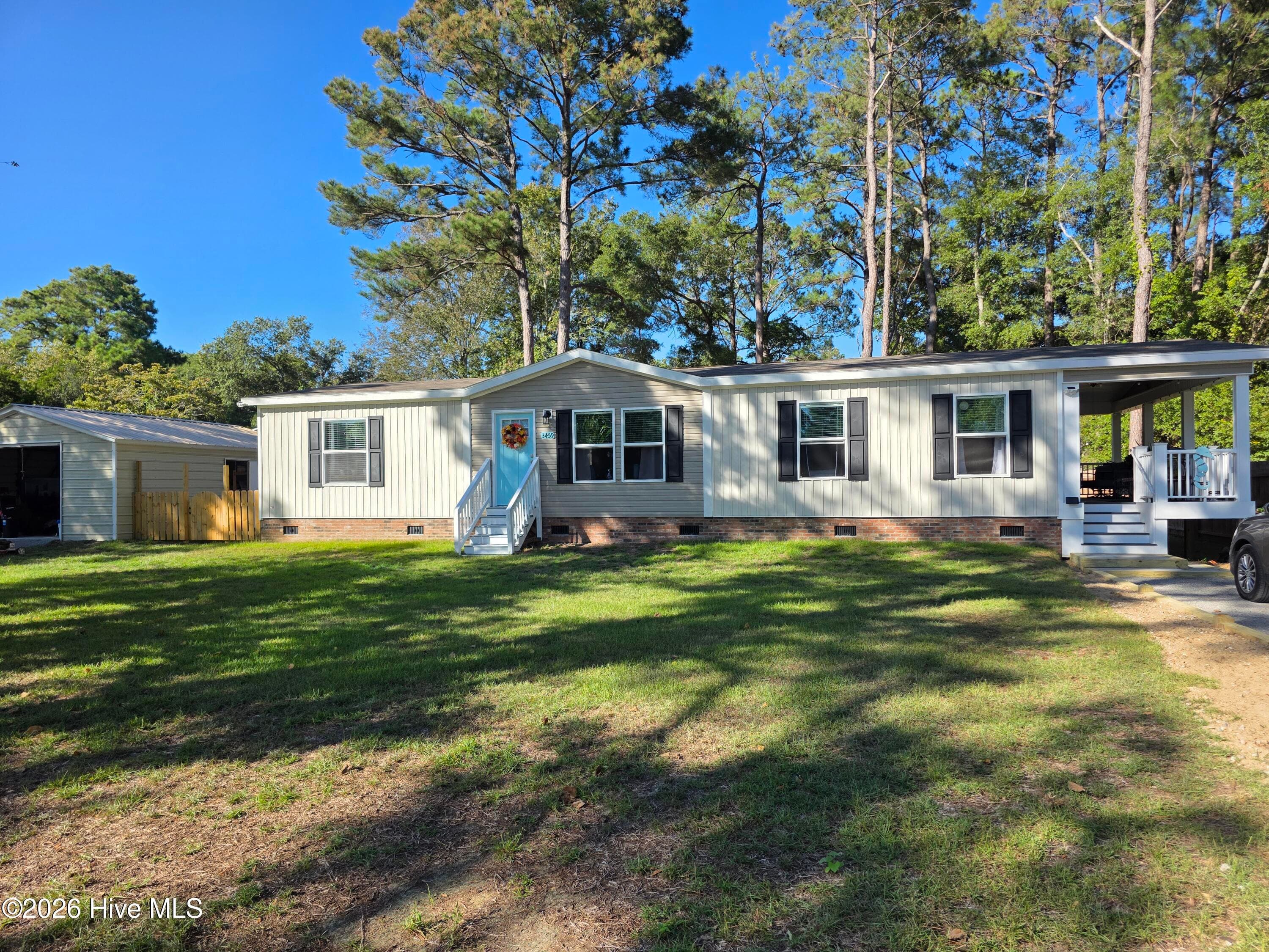 Manufactured Home at 3459 Lakeview Drive SW, Supply, NC 28462, photo 4 of 70