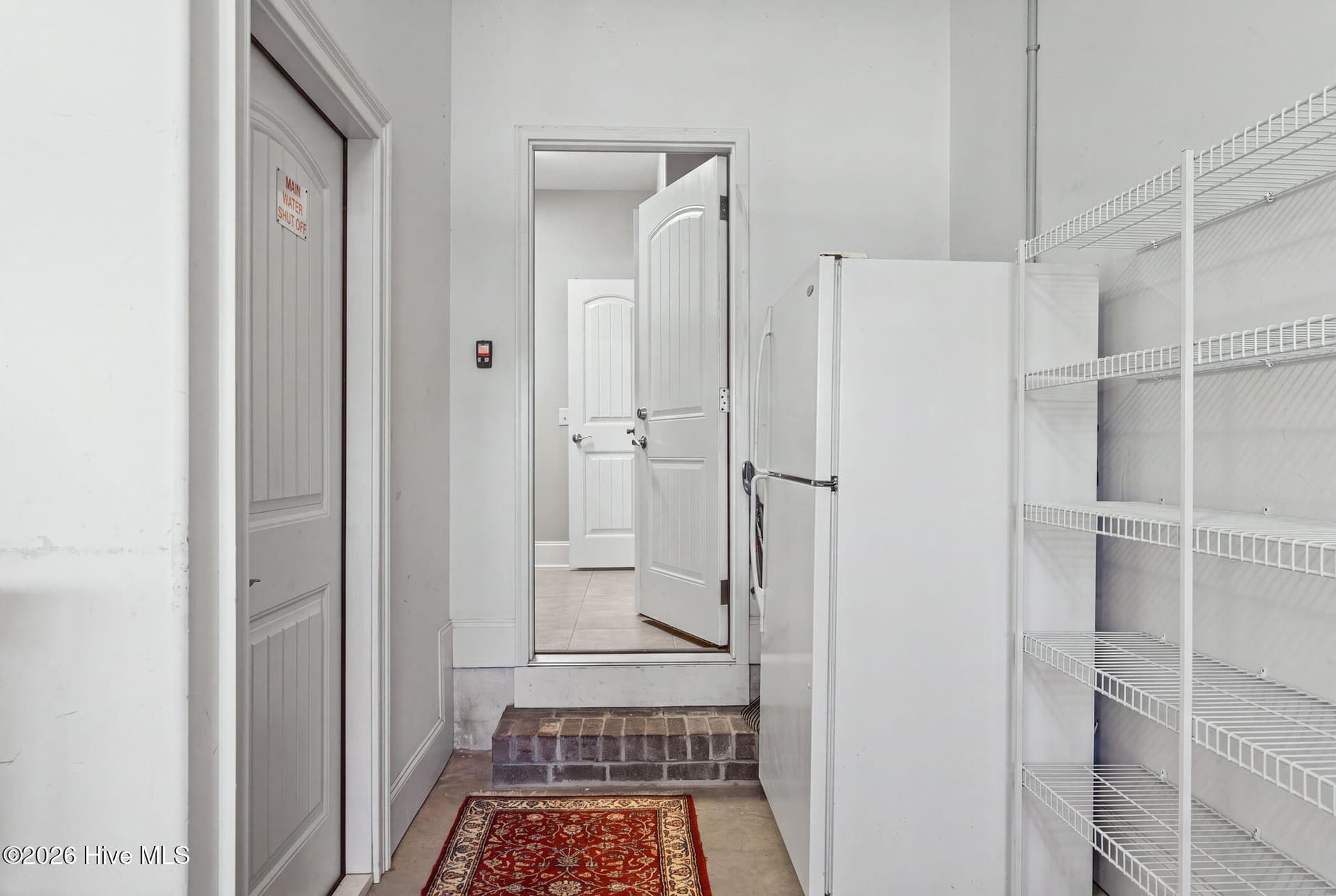 Garage entry from laundry room; - 6363 Havencrest Drive SW, Ocean Isle Beach, NC 28469