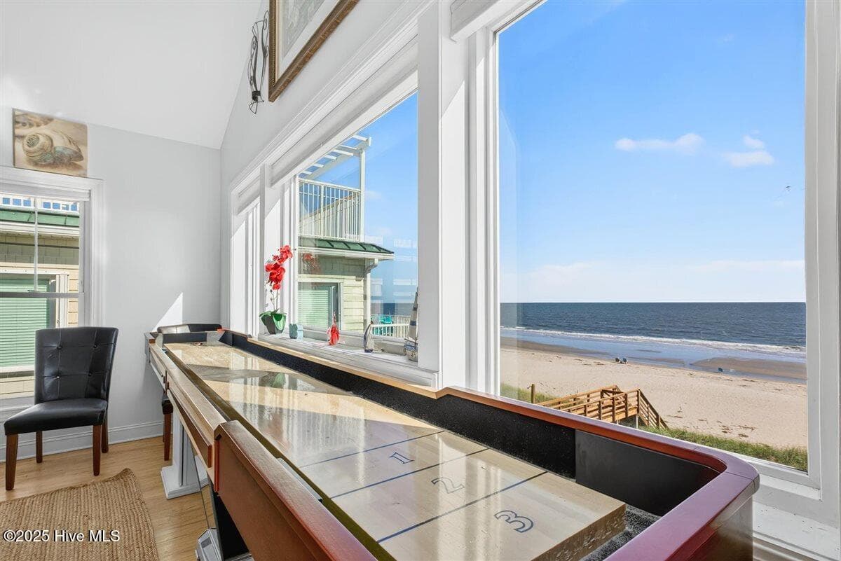 Shuffle board game at dining window overlooking the beach - 7 Coggeshall Drive W, Ocean Isle Beach, NC 28469