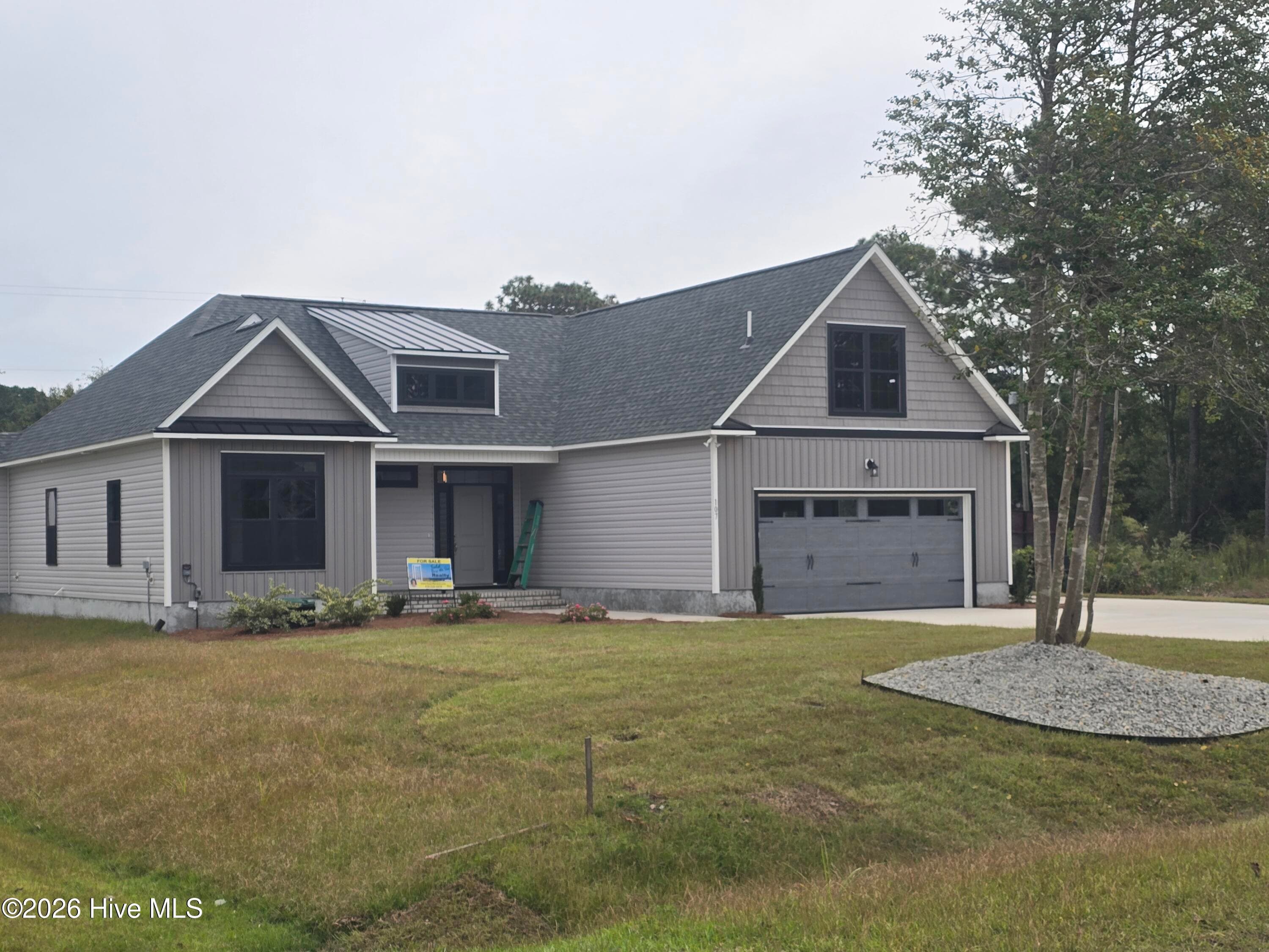 Single Family Residence at 107 Weathersbee Drive, Hampstead, NC 28443, photo 5 of 140