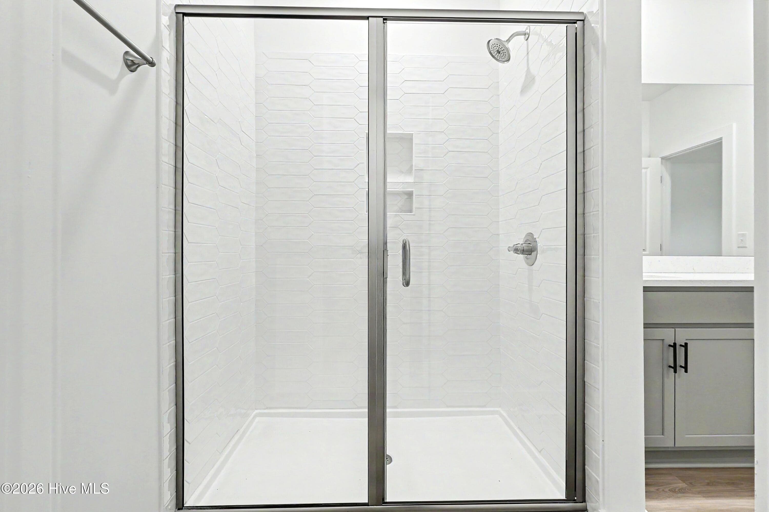 Walk-in Shower with Tile Surround in Owner's Suite - 2108 Cregan Cove SW (Lot 2), Ocean Isle Beach, NC 28469