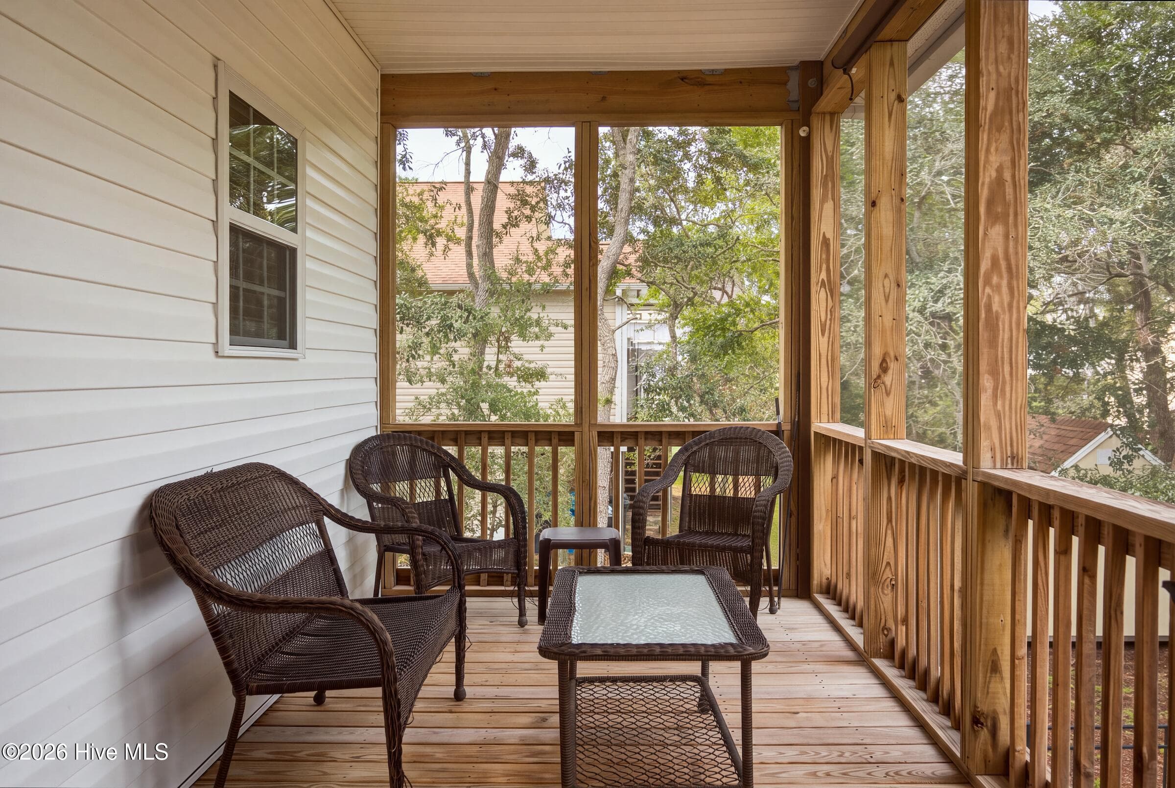 SCREENED BACK PORCH overlooking Back Yard - 225 NE 39th Street, Oak Island, NC 28465