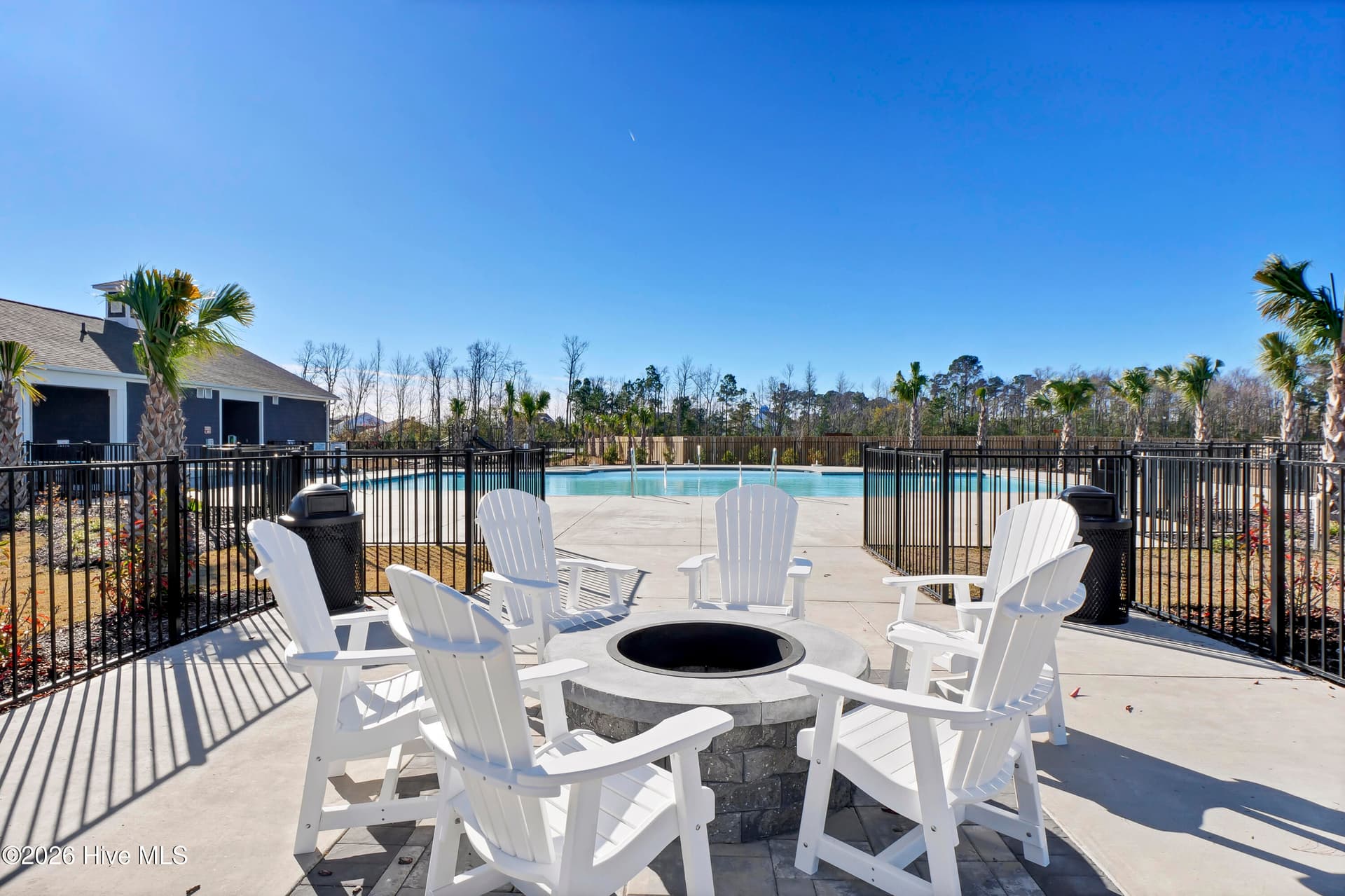 Neighborhood Pool Seating Area with Fire Pit - 512 Edgewater Way, Surf City, NC 28445