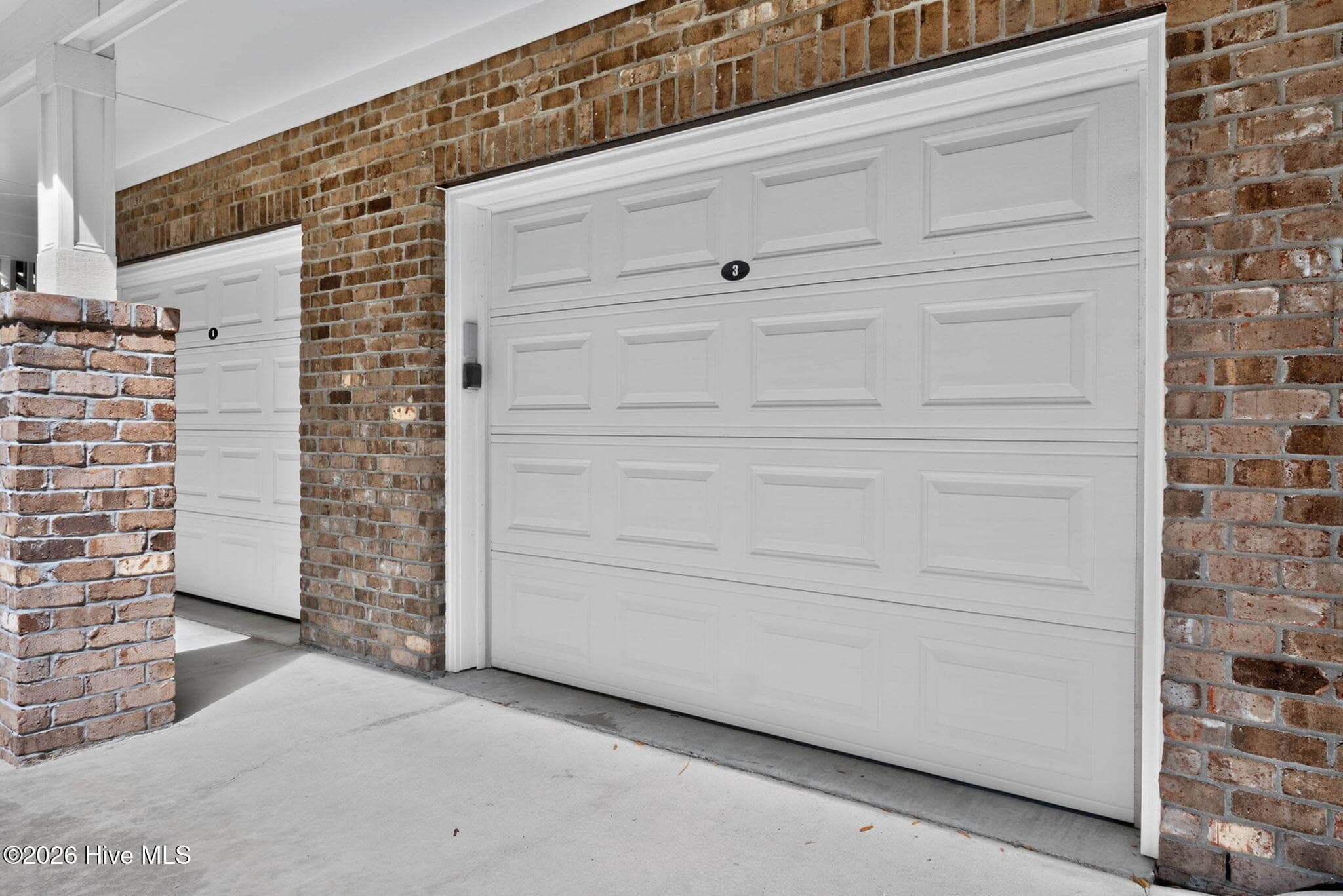 Garage attached to building for storage or your car - 7825 High Market Street #303, Sunset Beach, NC 28468