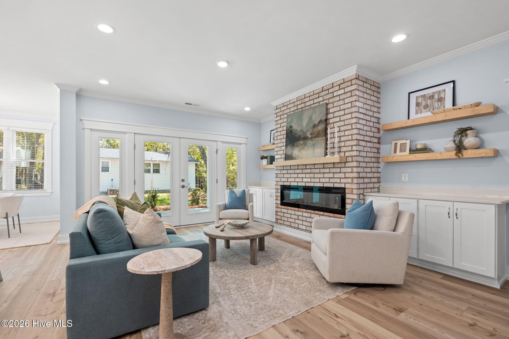 Photos of a staged model of the exact same plan - 312 NE 58th Street, Oak Island, NC 28465