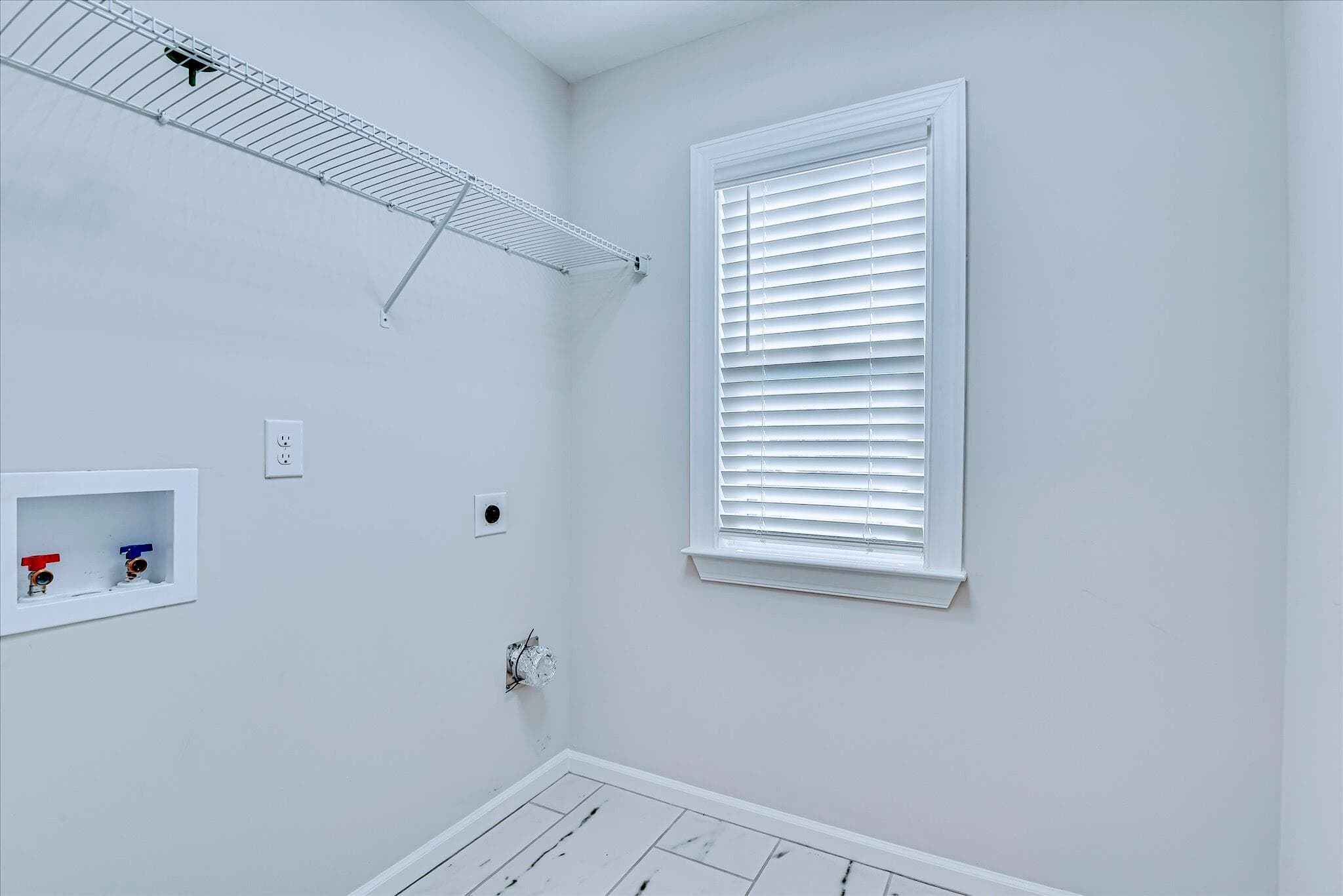 Keep the dirty laundry upstairs..but just for a little bit because having your laundry room upstairs is a convenience that won't keep laundry day away! - 903 Lillian Park Drive, Grovetown, GA 30813