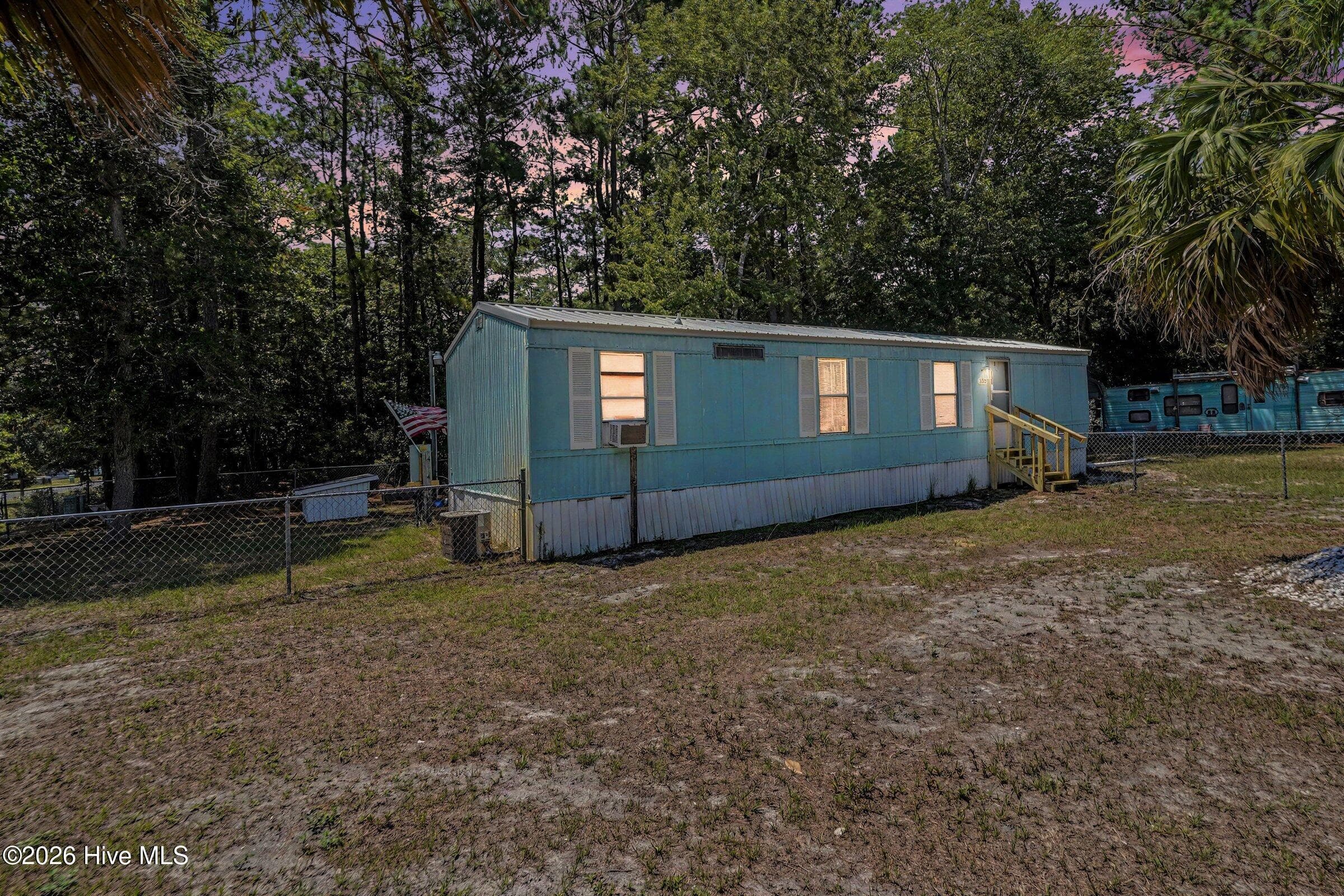 Manufactured Home at 3039 Lewis Street SW, Supply, NC 28462, photo 7 of 29