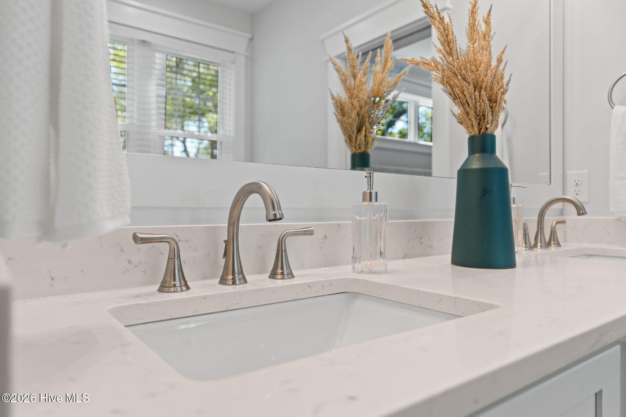 Photos of a staged model of the exact same plan - 312 NE 58th Street, Oak Island, NC 28465