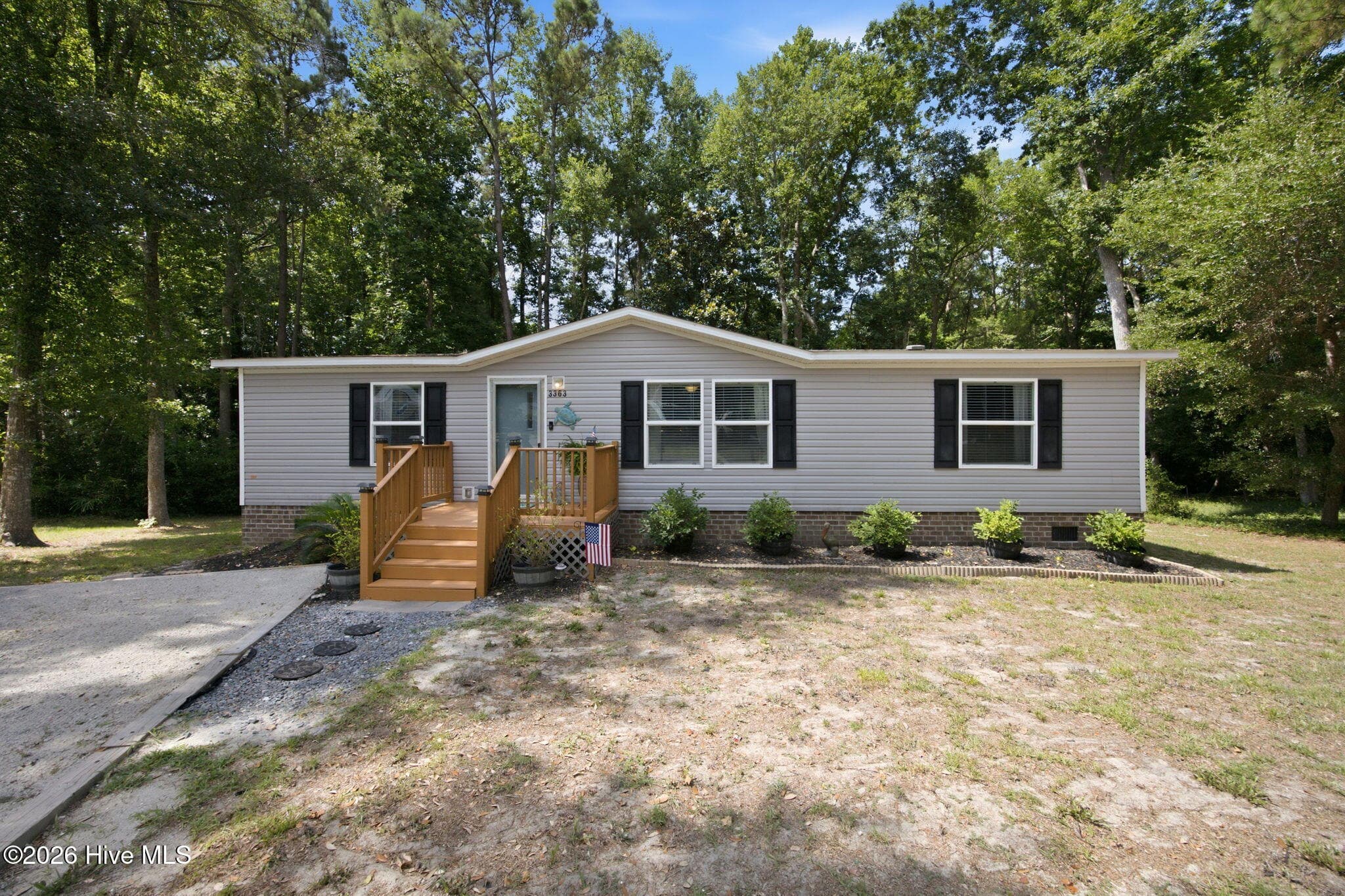 Manufactured Home at 3363 Teakwood Court SE, Bolivia, NC 28422, photo 3 of 34