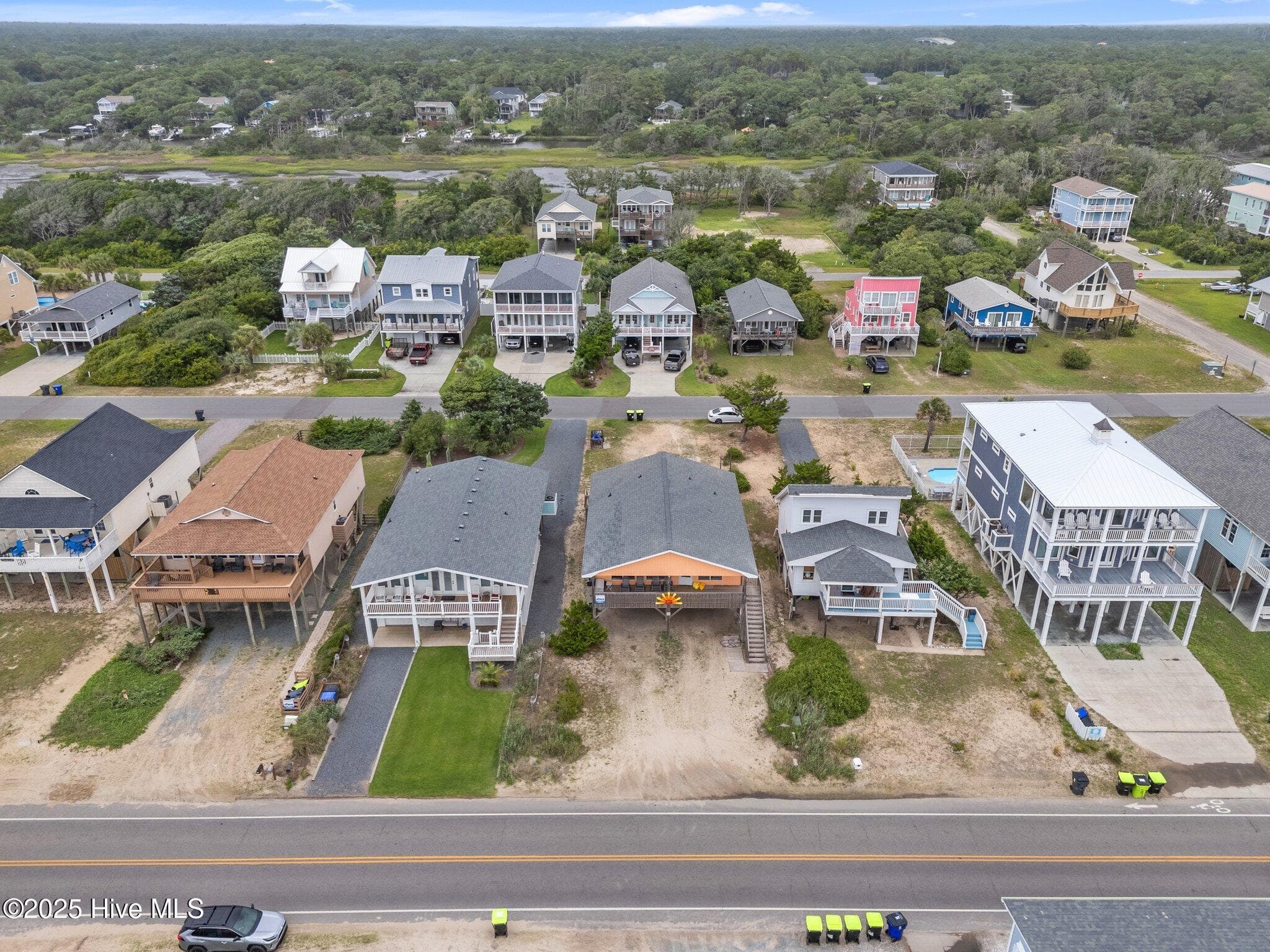Single Family Residence at 210 W Beach Drive, Oak Island, NC 28465, photo 7 of 42