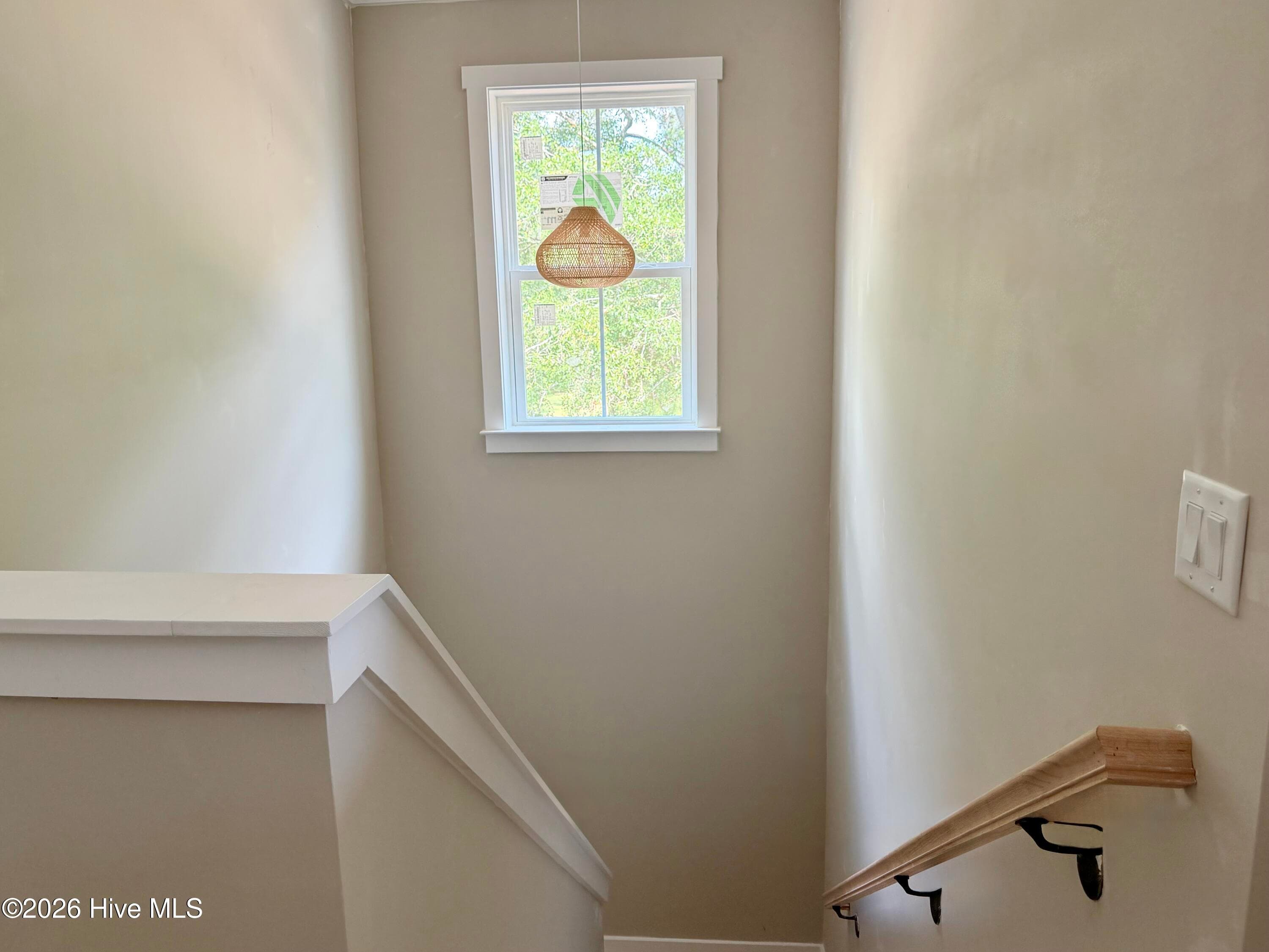 Staircase with custom lighting. - 550 Glenburnie Street NW, Calabash, NC 28467