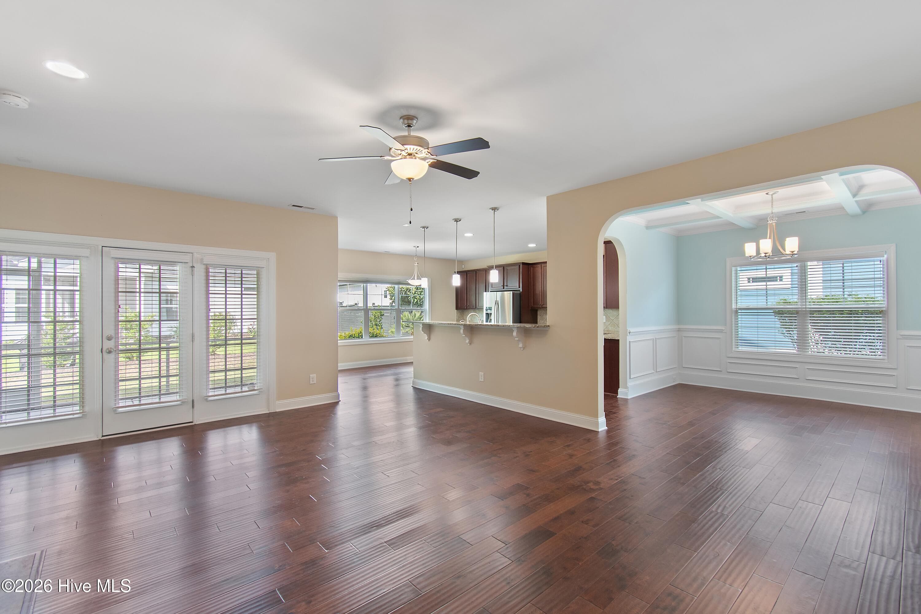 Notice the number of windows throughout the home. Large living room, dining room. - 1674 Back Bay Drive SW, Shallotte, NC 28470