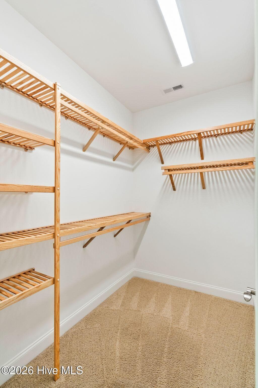 Primary suite has 2 walk in closets - 3710 Friendly Orange Court NE, Leland, NC 28451