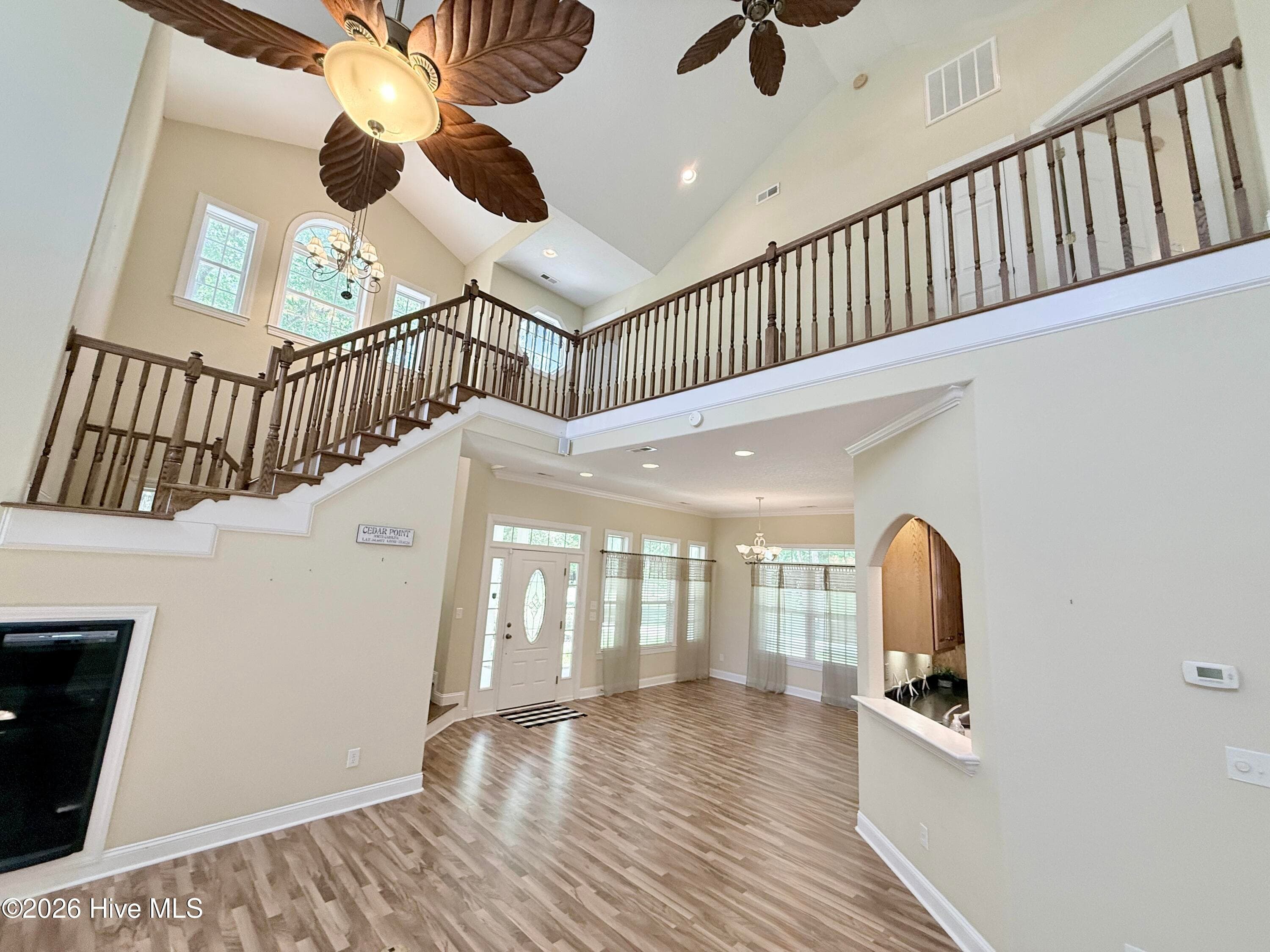 Living Room looking toward front door in formal dining room - 109 Sun Burst Circle, Cedar Point, NC 28584
