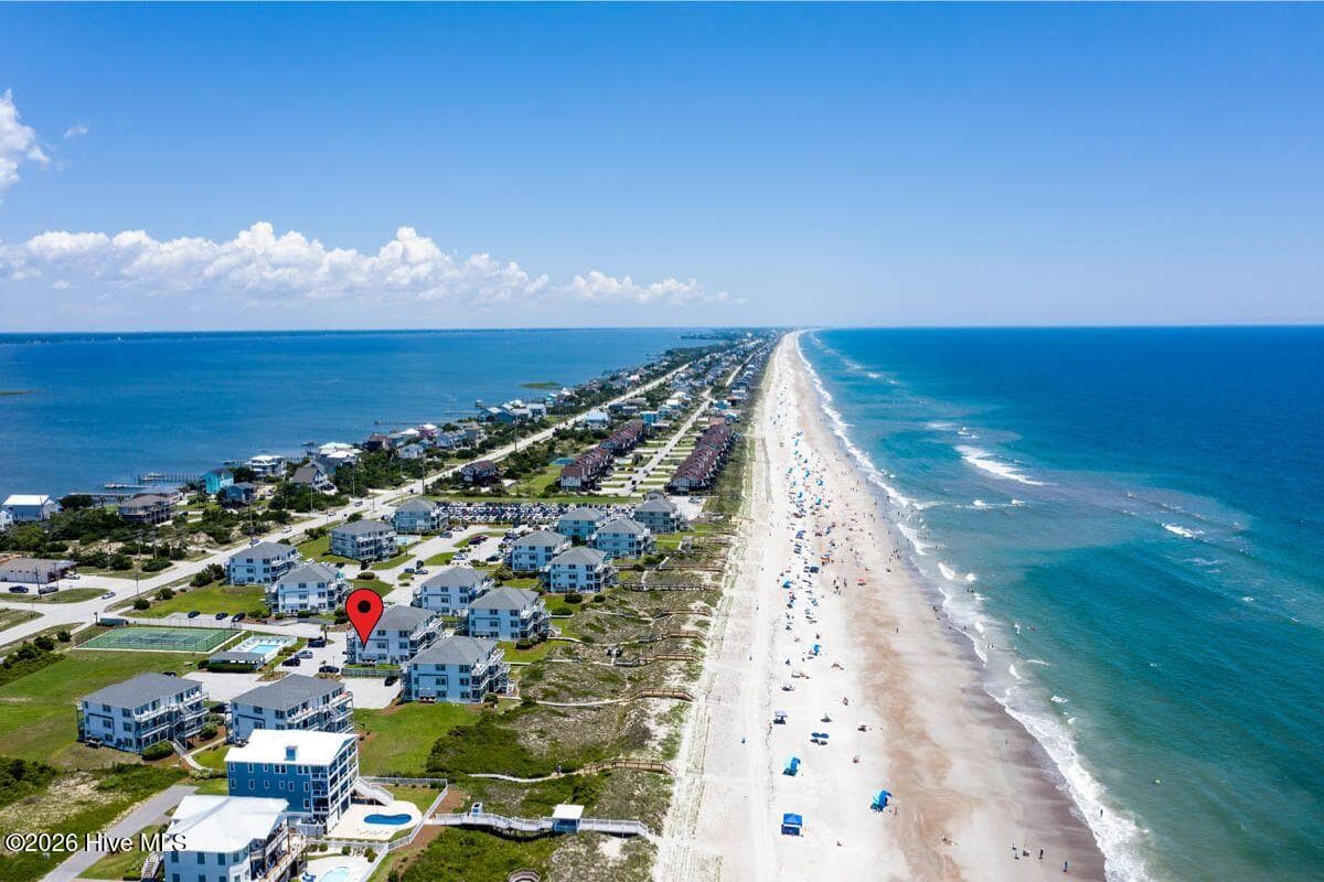 Located in the Croatan School District and the heart of Emerald Isle, the property is just minutes from local restaurants, shopping, the fishing pier, and area attractions while still offering the relaxed setting of an oceanfront community. - 2909 Pointe West Drive 3b1, Emerald Isle, NC 28594