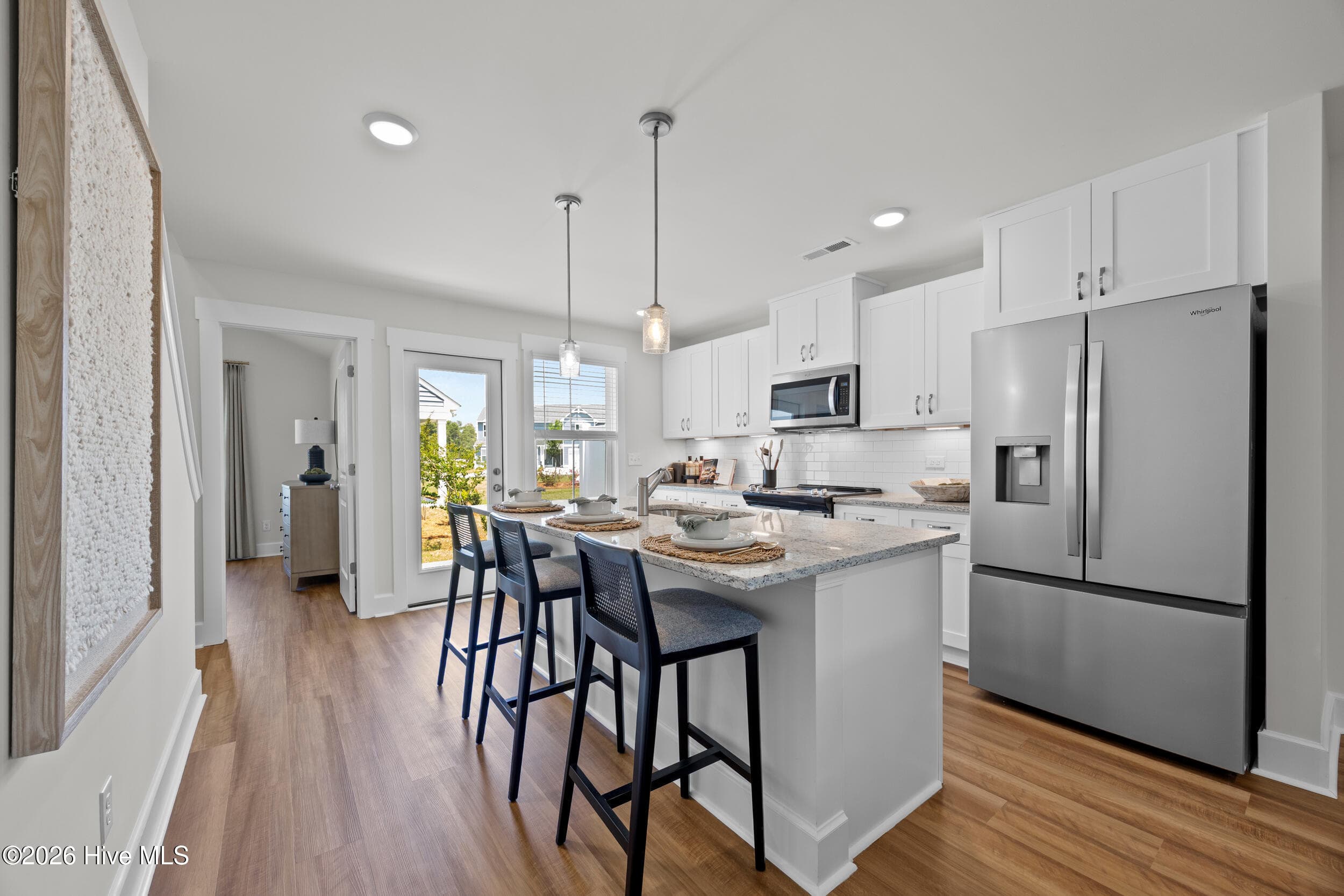 Photo is of a similar completed home, not the actual property. Some finishes/features may vary. - 2156 Summer Cottage Way 193, Leland, NC 28451