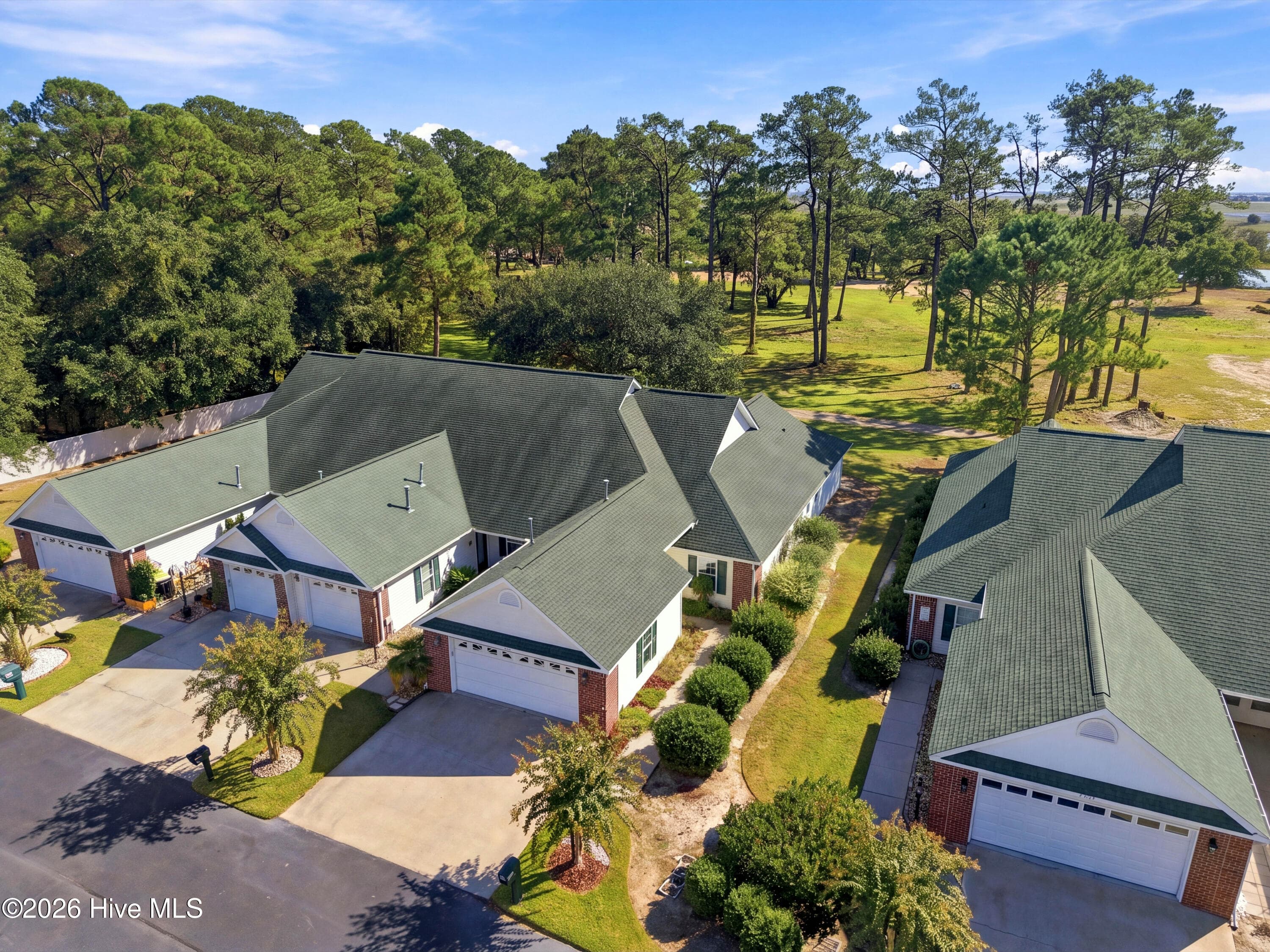 Front aerial view - 507 Sunset Oaks Lane, Sunset Beach, NC 28468