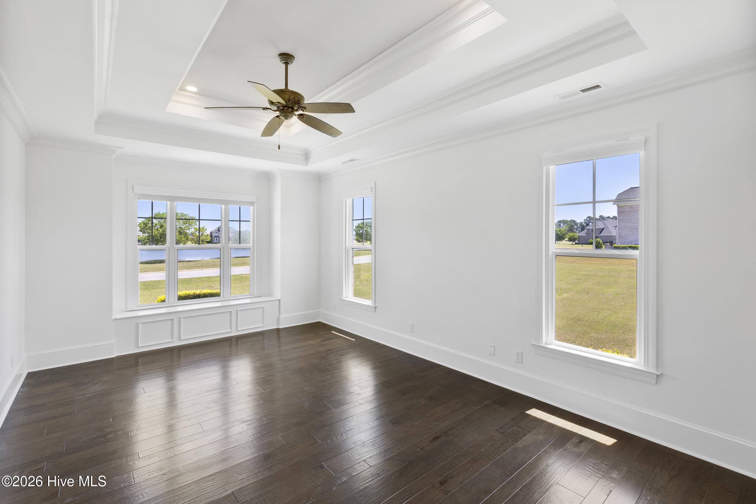 crafted ceiing with two level trey and craftsmanship in detail of woodwork - 1357 Autumn Lakes Drive, Grimesland, NC 27837
