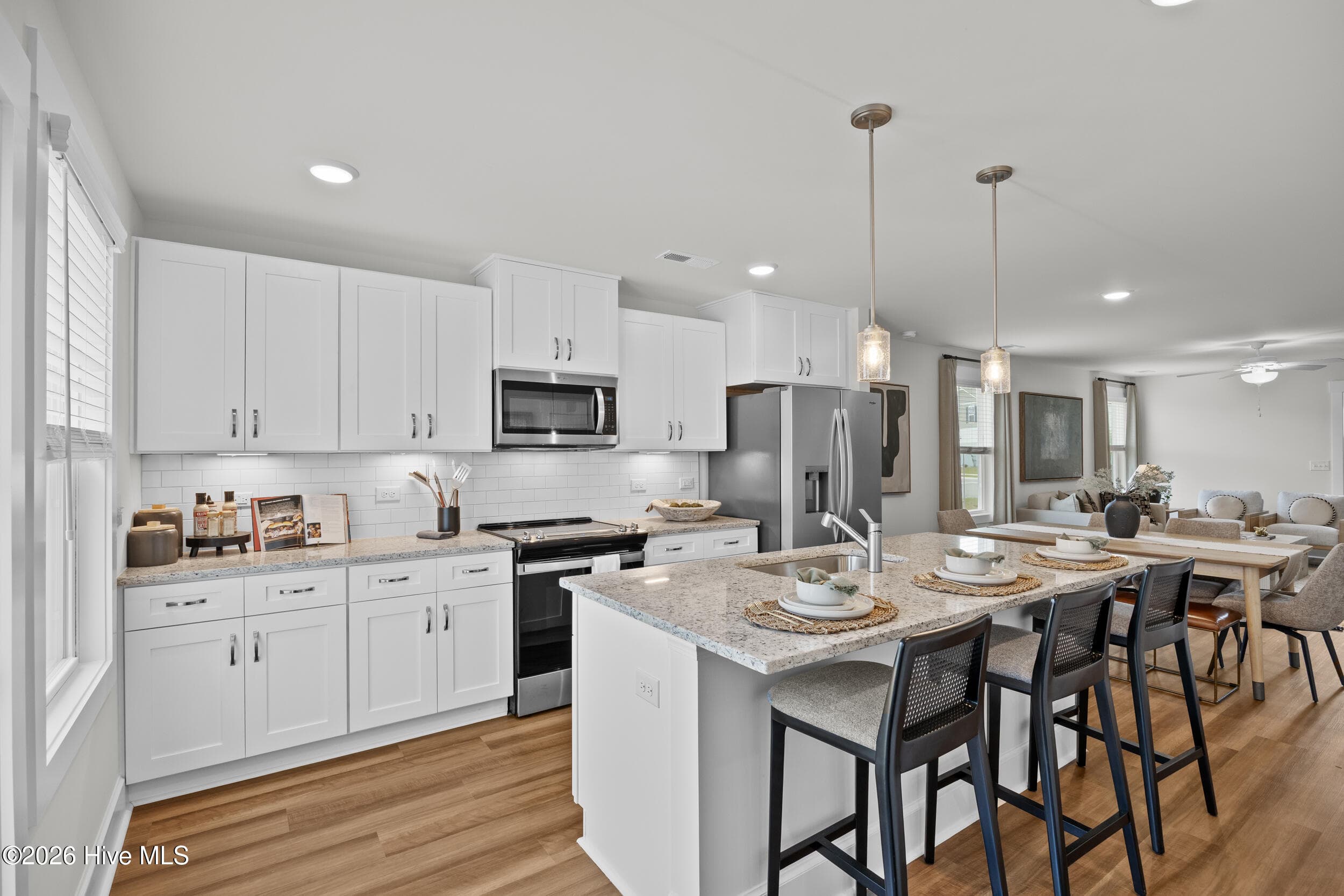 Photo is of a similar completed home, not the actual property. Some finishes/features may vary. - 2156 Summer Cottage Way 193, Leland, NC 28451
