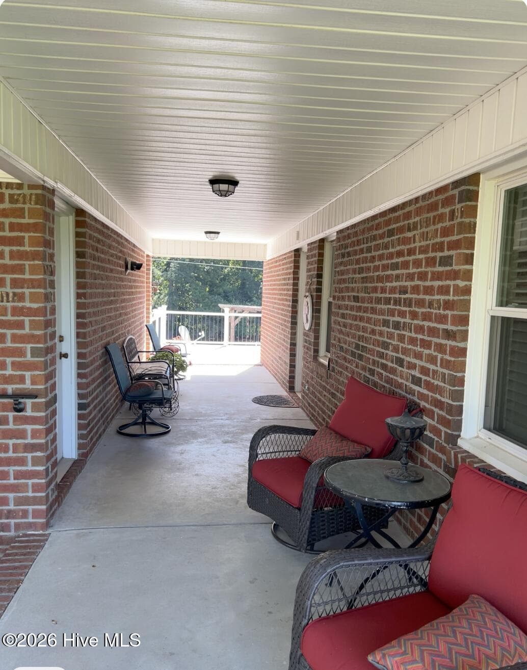Breeze way between Garage and main house. - 642 Enoch Road, Clinton, NC 28328