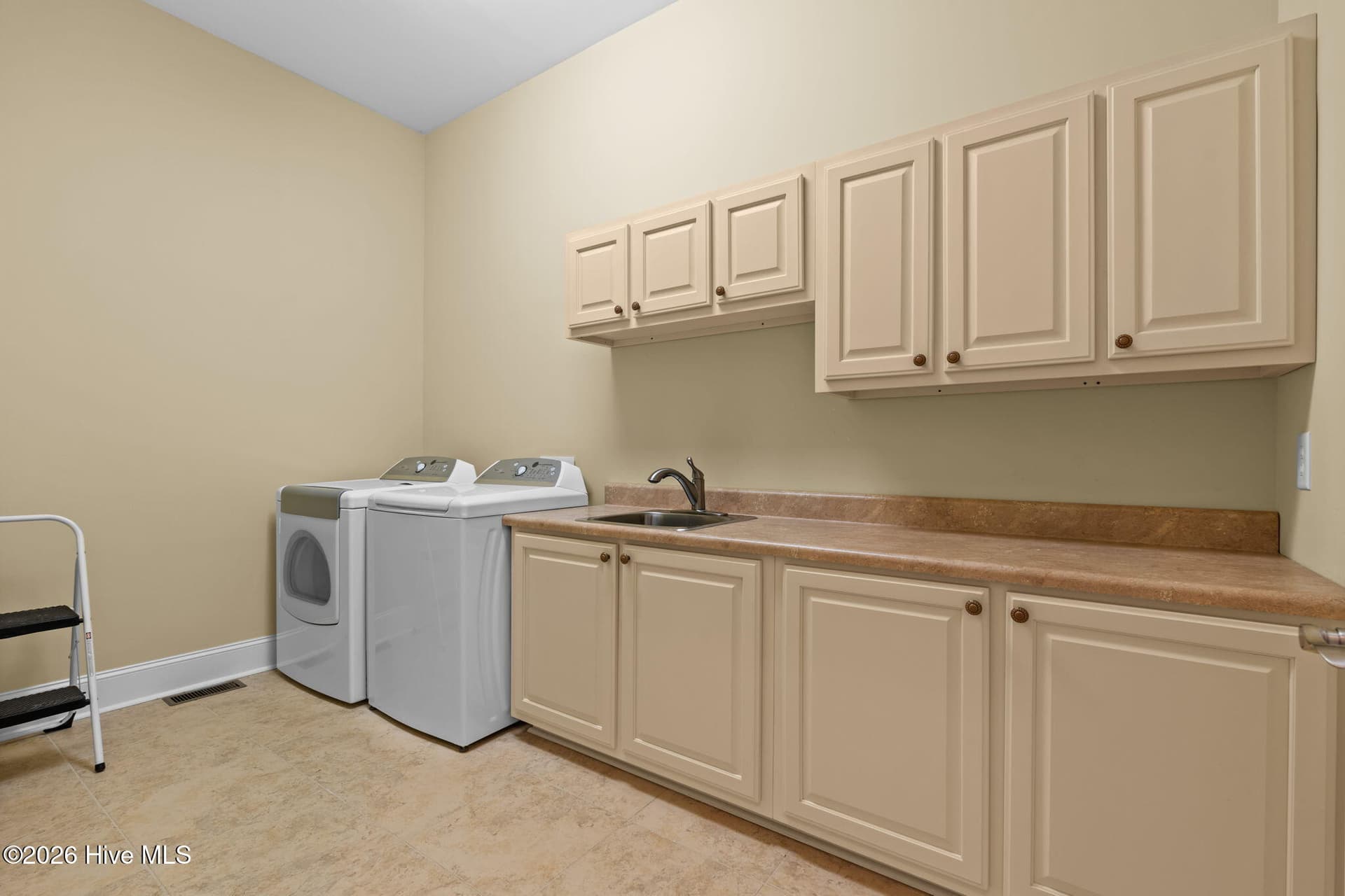 Downstairs laundry near Owners Suite & BR 2 - 9274 Oldfield Road NW, Calabash, NC 28467