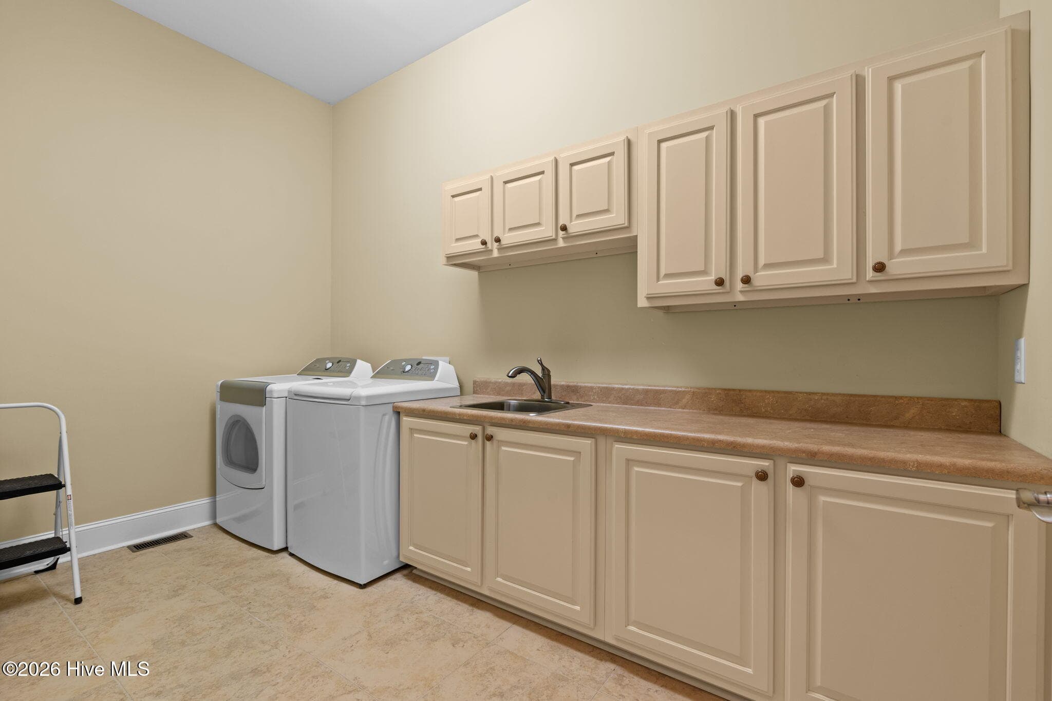 Downstairs laundry near Owners Suite & BR 2 - 9274 Oldfield Road NW, Calabash, NC 28467