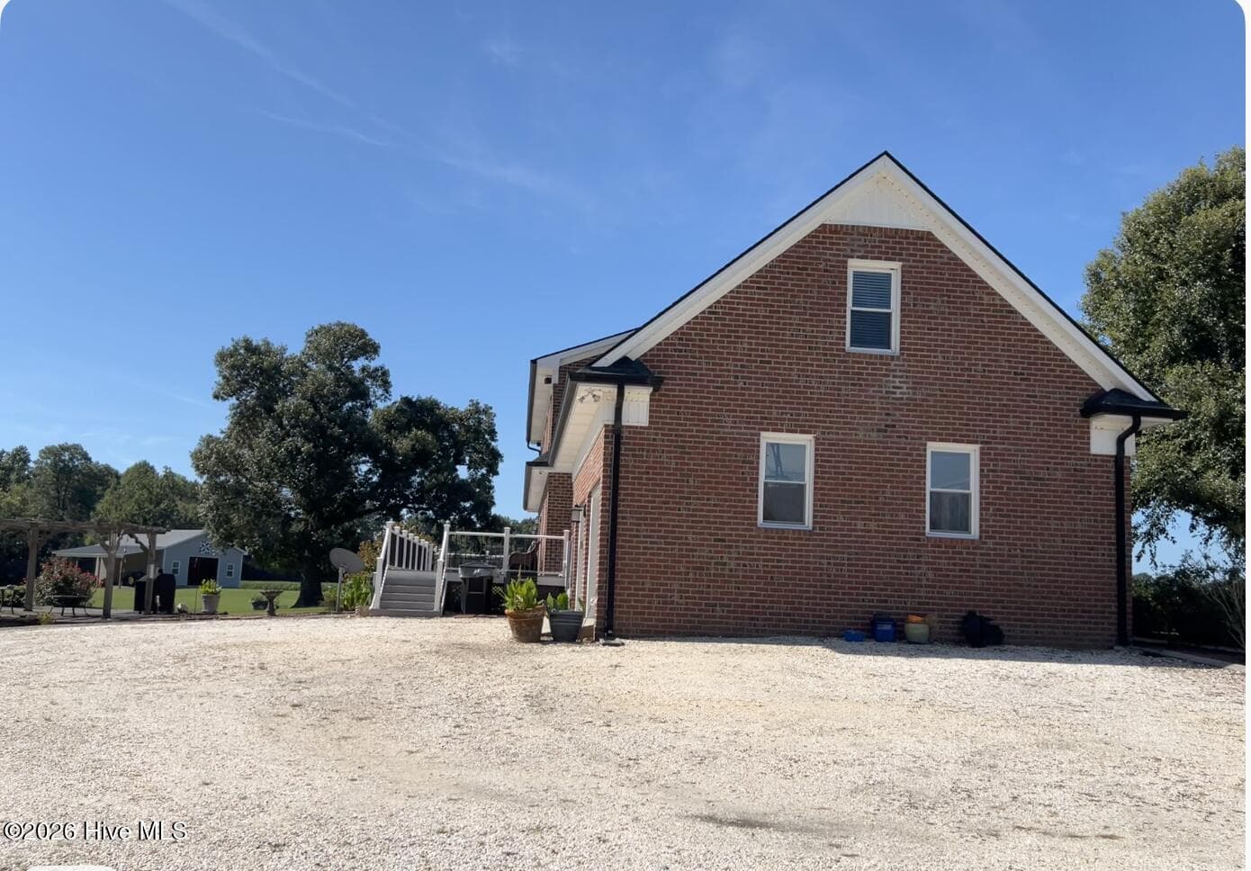 Left side of house next to driveway. - 642 Enoch Road, Clinton, NC 28328