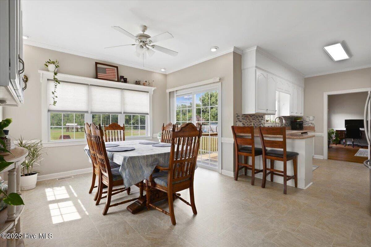 Large open kitchen with bar area - 105 Pointe Drive, La Grange, NC 28551