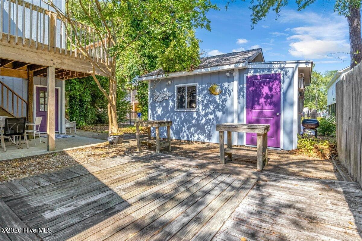 Purple door is storage - 109 NE 30th Street, Oak Island, NC 28465