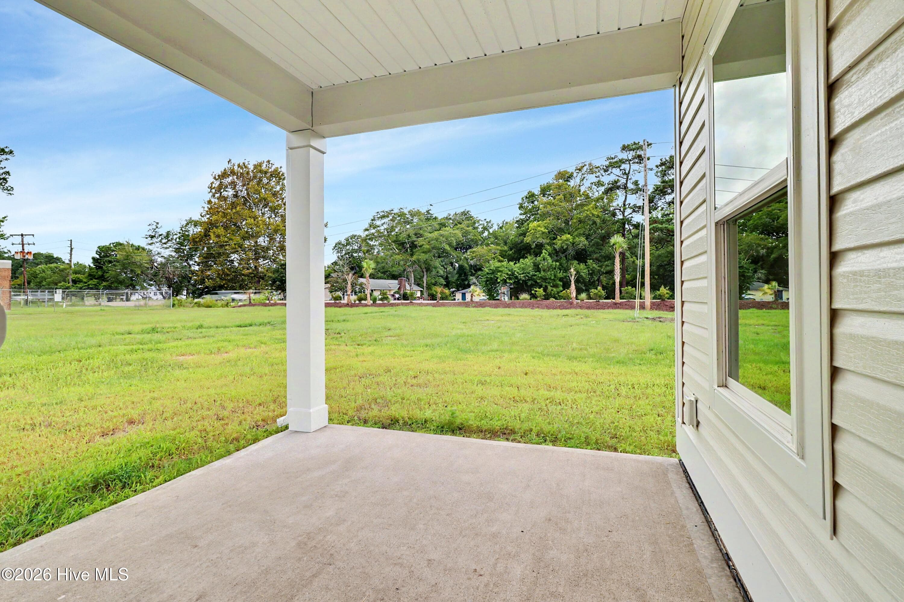 Spacious Covered Patio with Views of the 10th Hole at The Links at Brick Landing Golf Course - 2108 Cregan Cove SW (Lot 2), Ocean Isle Beach, NC 28469