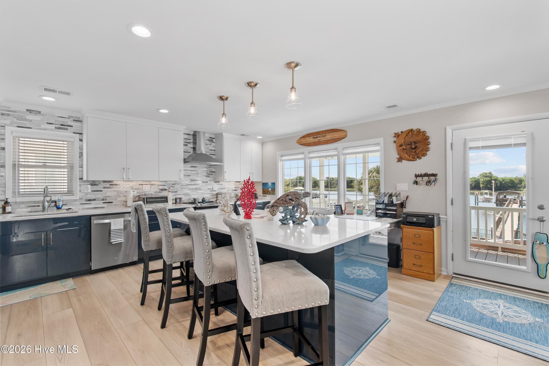 Updated kitchen with pendant lighting, sophisticated finishes. - 2024 Camelot Drive SW, Ocean Isle Beach, NC 28469