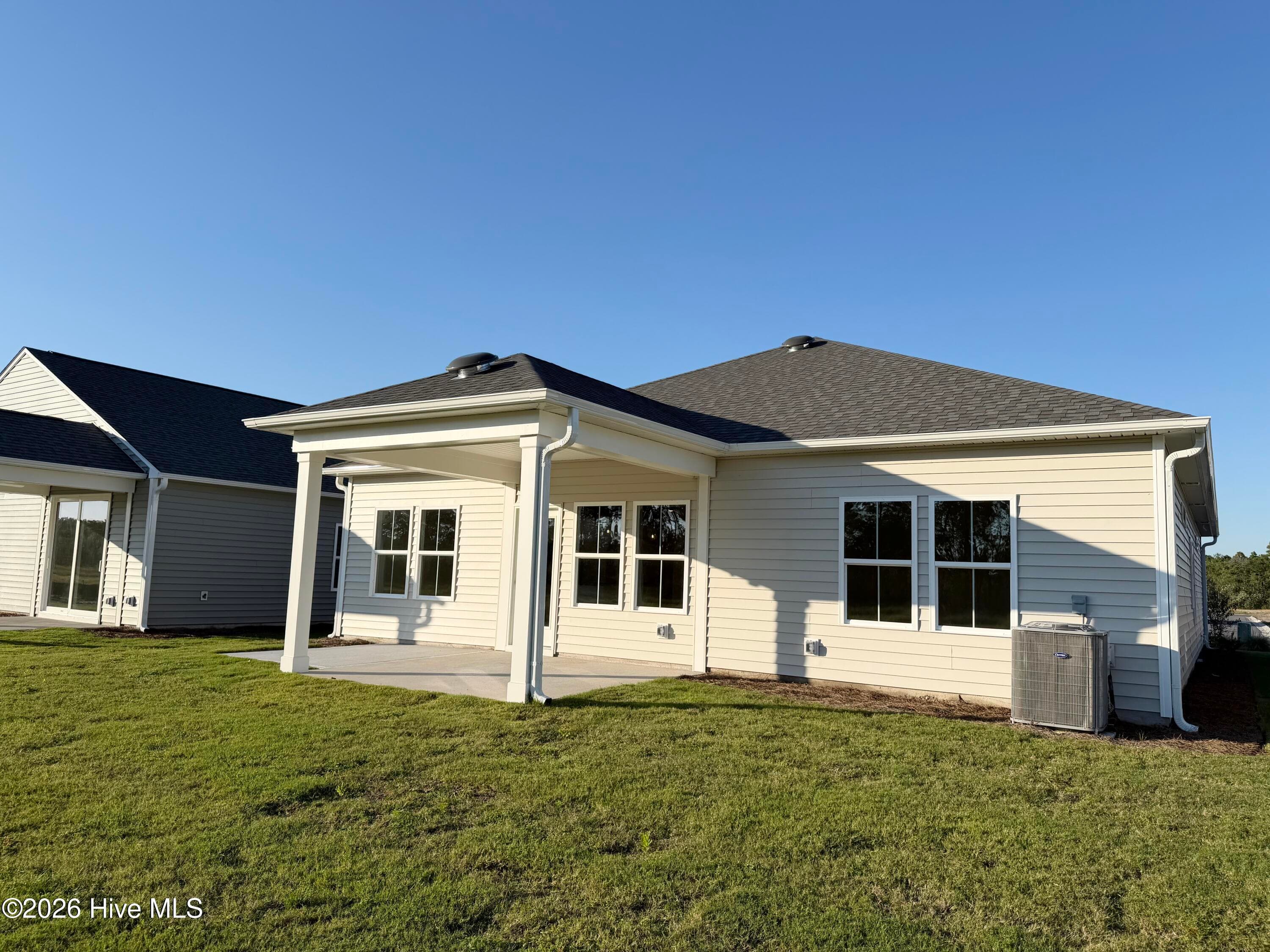 Home shown is a representation of the floor plan and may include optional features or upgrades. Elevations, materials, colors, - 758 Pelican Cv Way SE 298, Southport, NC 28461