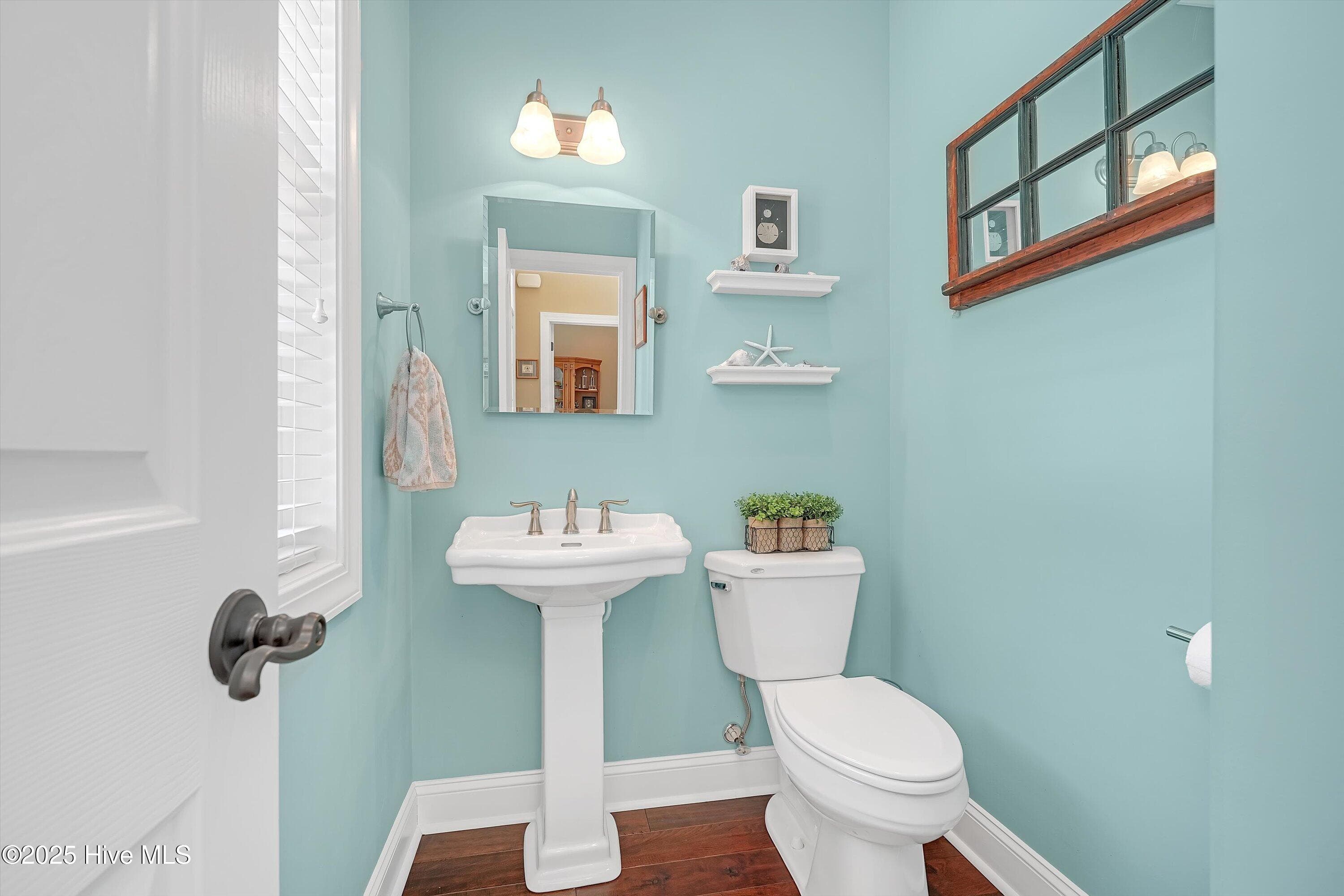 Half Bath at front door - 102 Reflection Court SW, Ocean Isle Beach, NC 28469