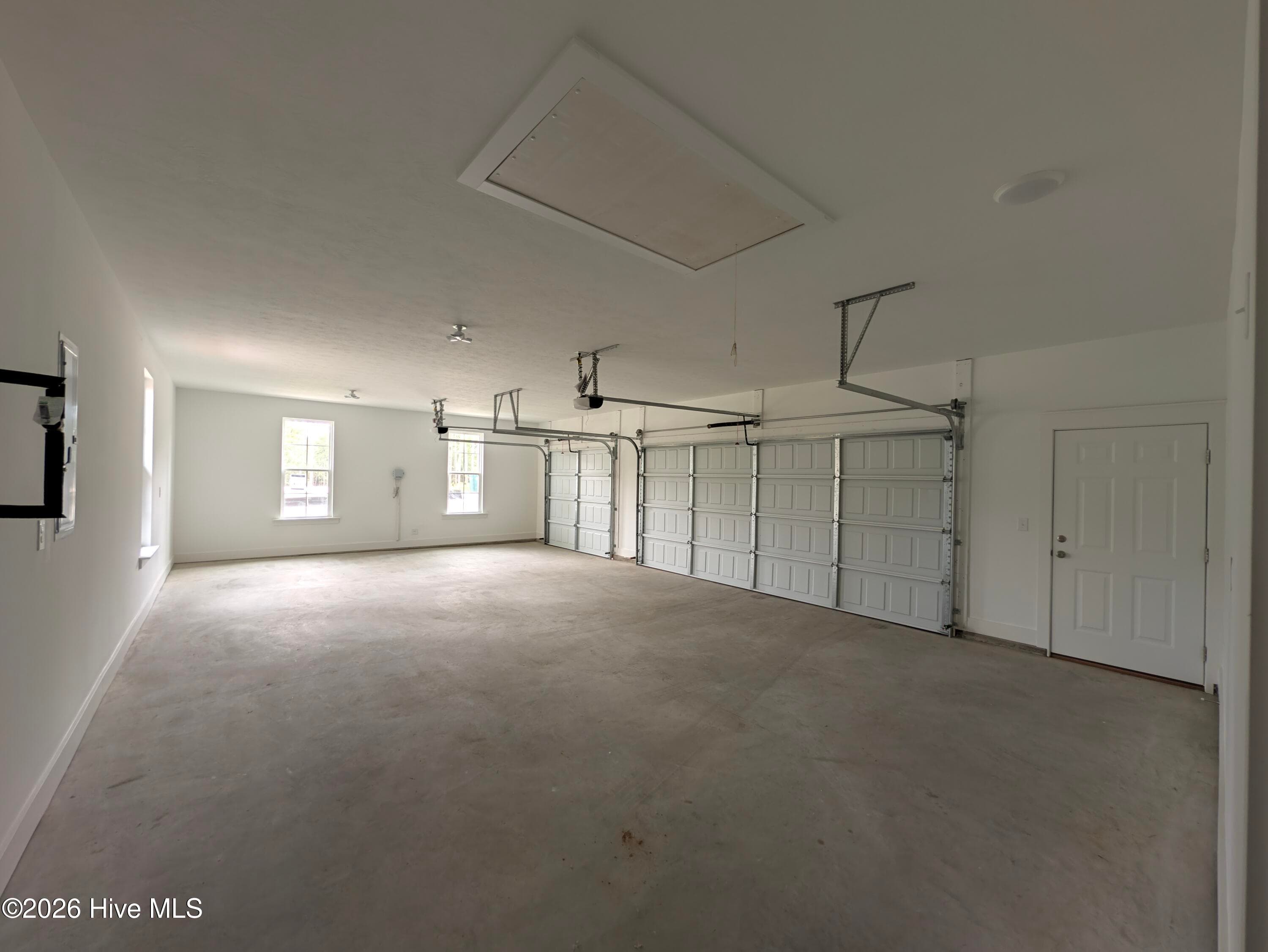 Spacious garage w/pull-down stairs - 434 Longshadow Drive, Aiken, SC 29803
