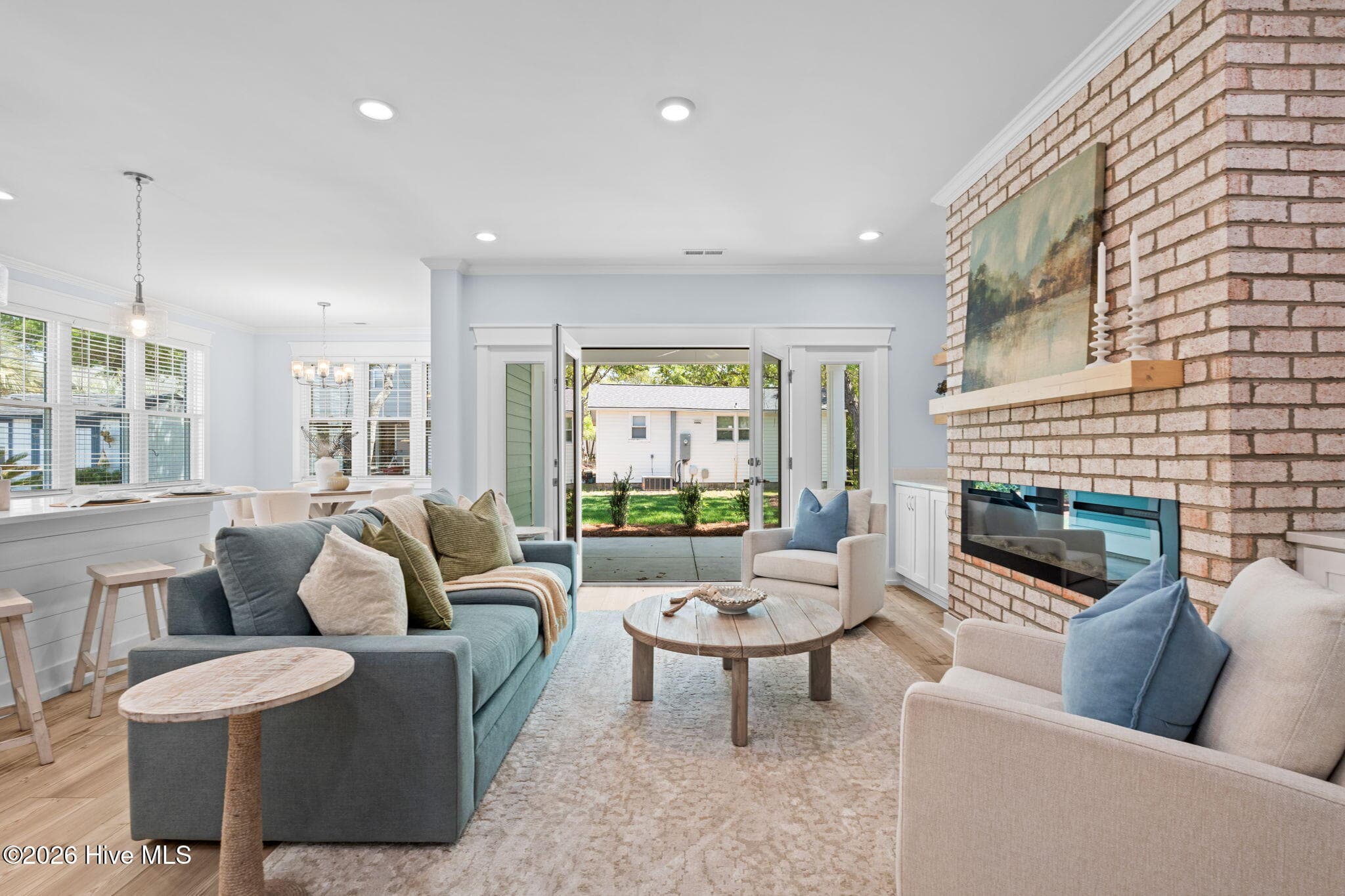 Photos of a staged model of the exact same plan - 312 NE 58th Street, Oak Island, NC 28465
