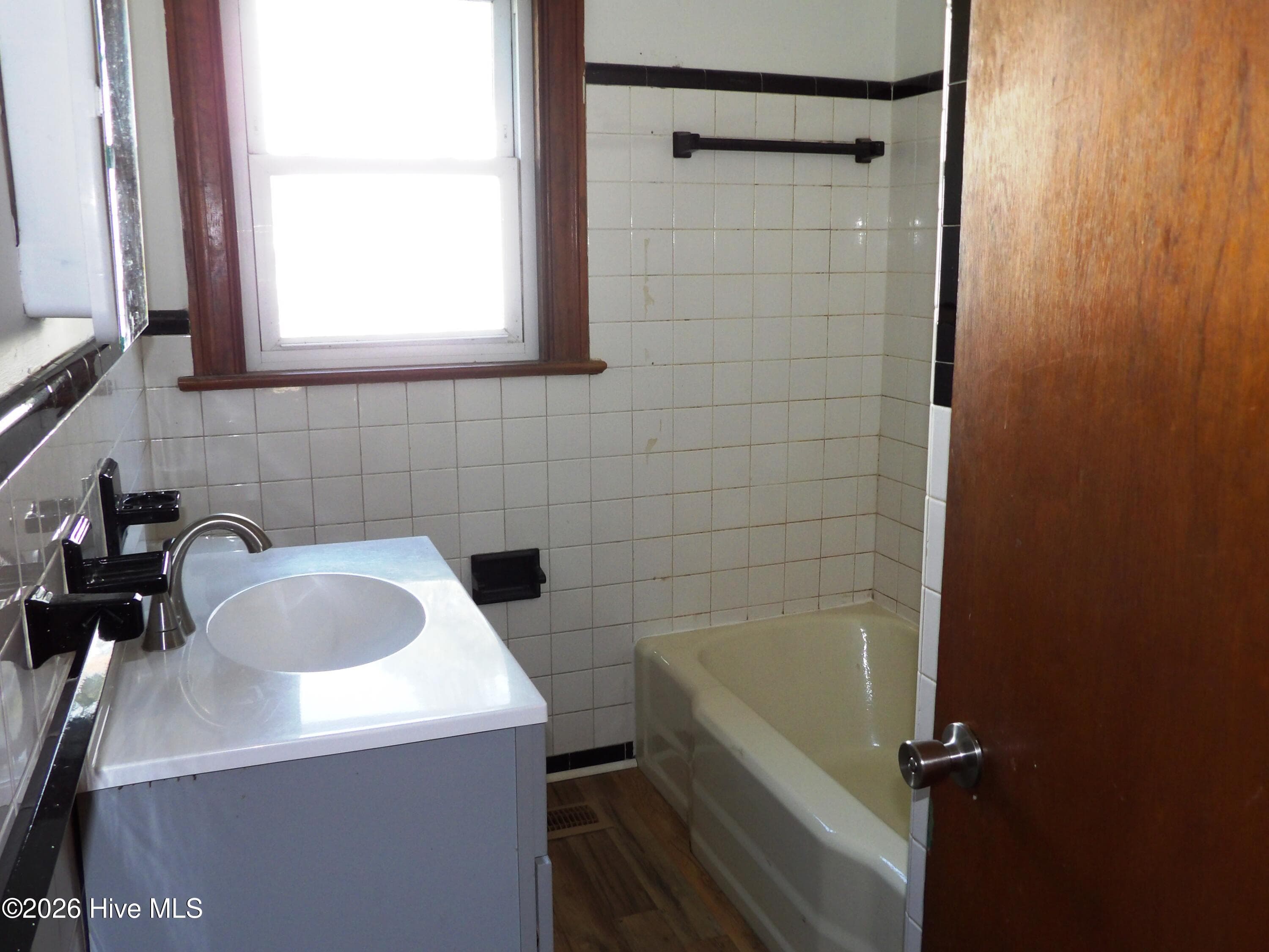 Single Family Residence at 1113 Woodrow Street S, Wilson, NC 27893, photo 5 of 15