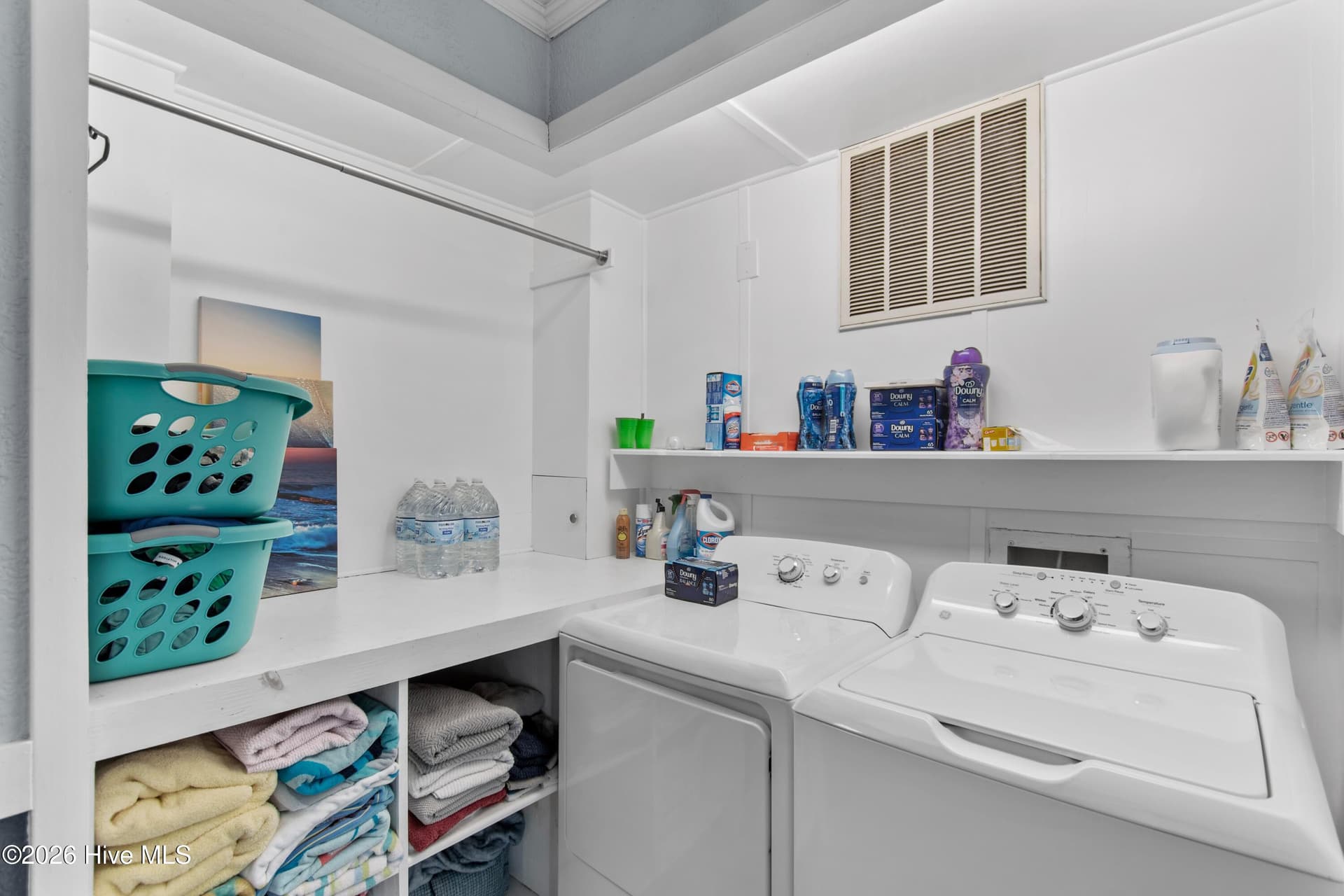 Laundry is on ground floor- ideal for throwing towels in after a day on the boat. - 2024 Camelot Drive SW, Ocean Isle Beach, NC 28469