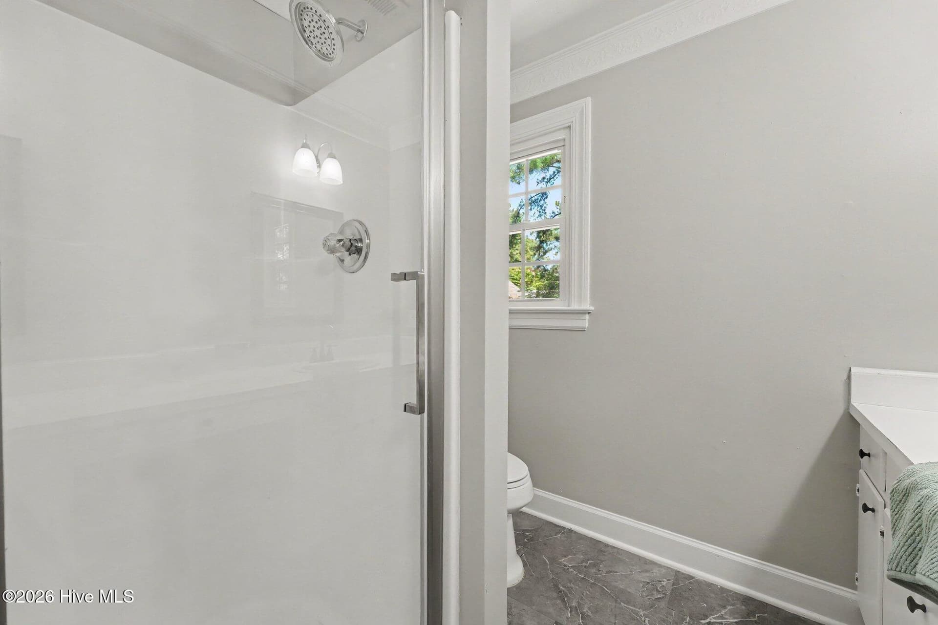 Master bath with walk in shower and door. - 2112 Burnside Drive NW, Wilson, NC 27896
