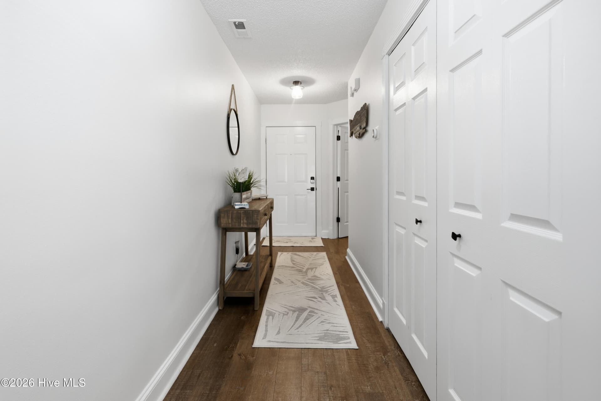 Beautiful Unit Entry & Utility Closet - 908 Resort Circle Unit 203, Sunset Beach, NC 28468