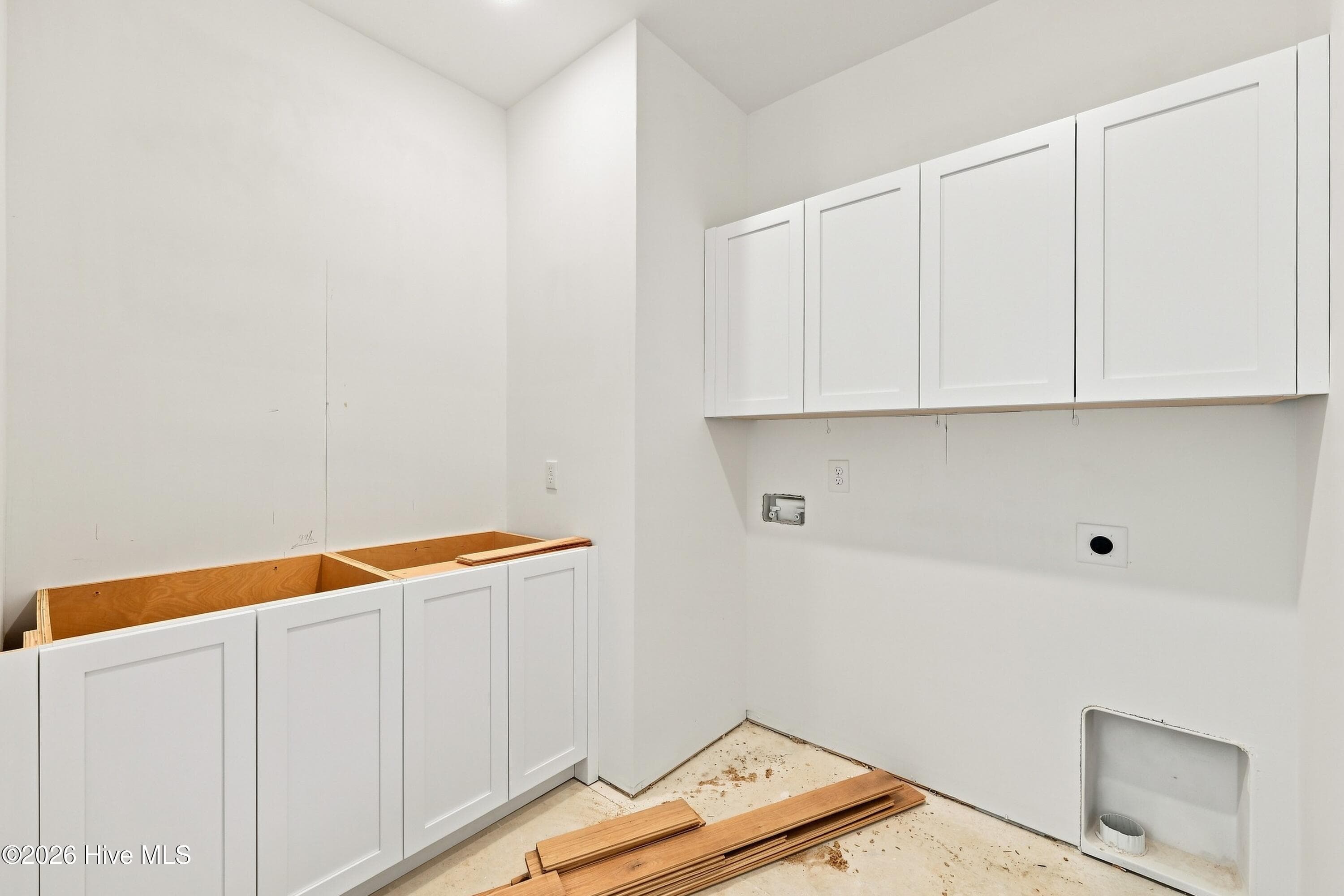 Laundry room with utility sink - 2nd floor - 2302 Emerald Drive, Emerald Isle, NC 28594