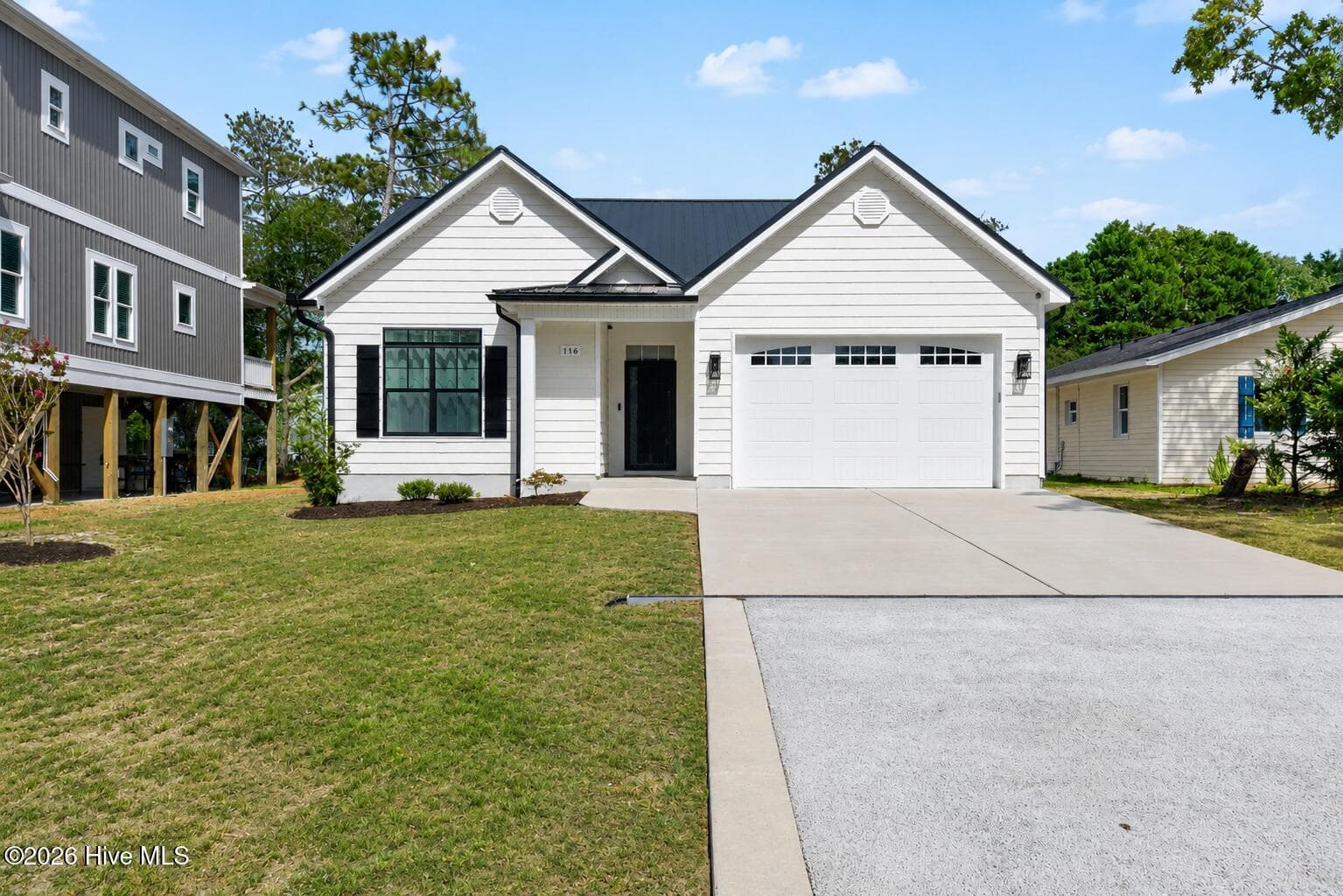 Single Family Residence at 116 NW 14th Street, Oak Island, NC 28465, photo 3 of 50